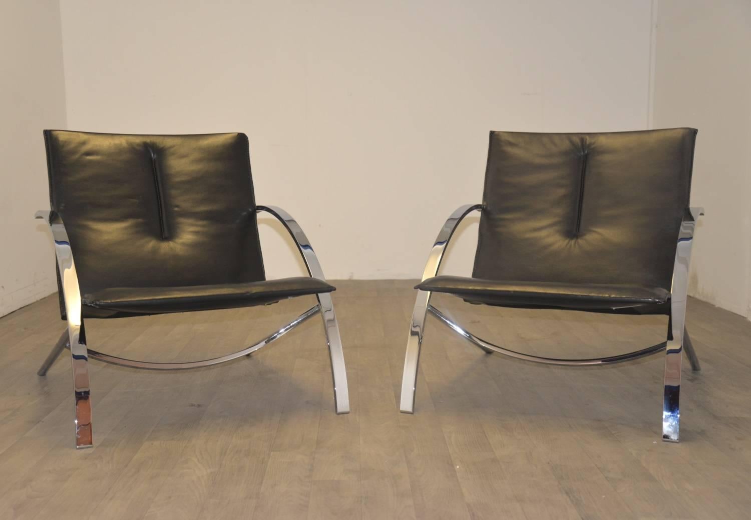 Competitive shipping costs for our US continent and European customers.
Try before you buy service for our Mainland UK customers.
Returns accepted. 

Pair of Paul Tuttle arco lounge chairs for Strässle International. Built to incredibly high