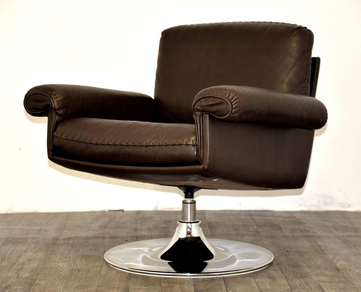 Discounted airfreight for our US and International customers (2 weeks door to door)


Vintage 1970s de Sede DS 31 lounge armchair in soft brown aniline leather with superb whipstitch edge detail. This swivel lounge armchair was built, circa 1970s by