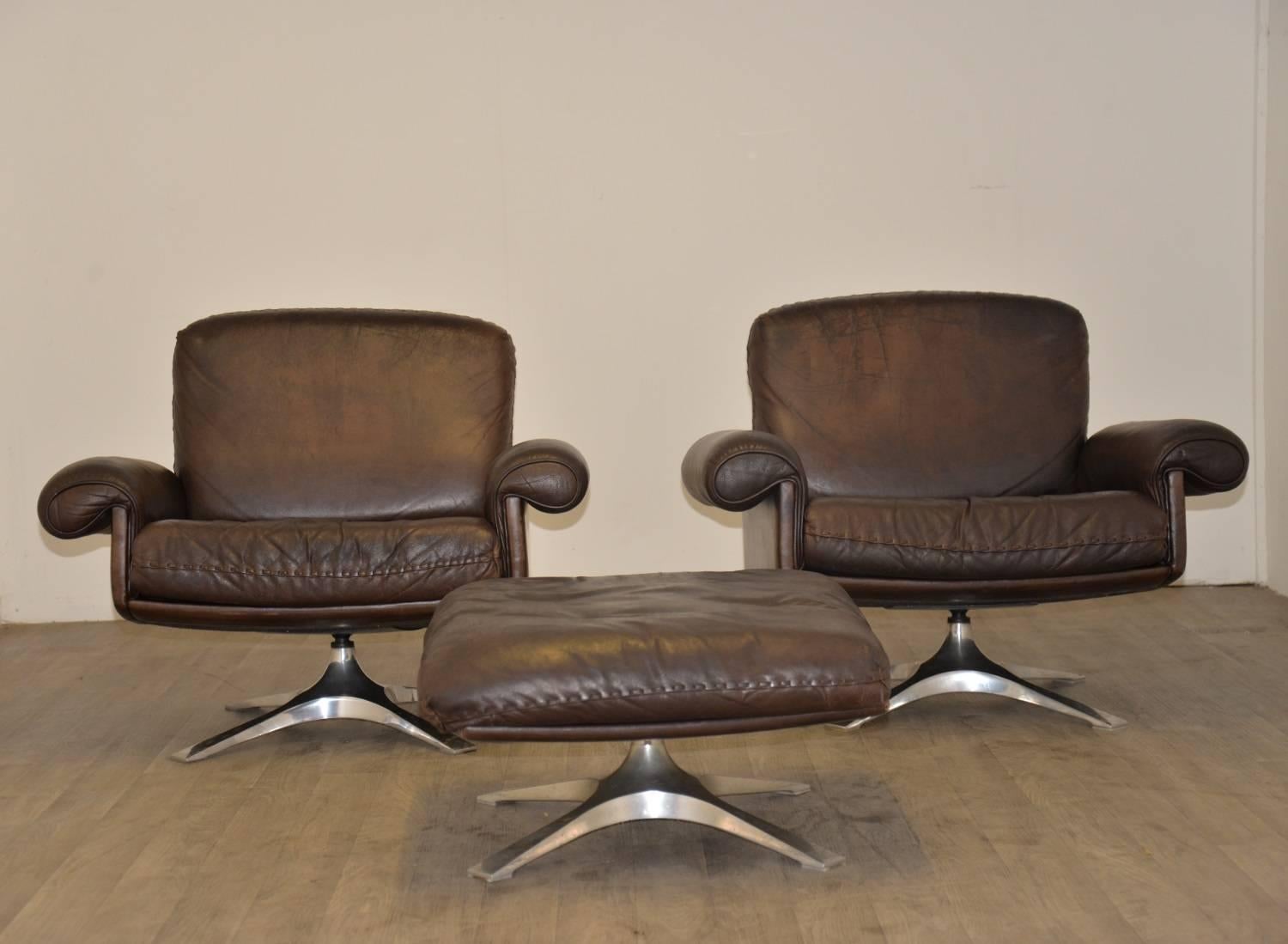 Discounted airfreight for our US Continent customers ( from 2 weeks door to door)

The Cambridge Chair Company brings to you a pair of highly desirable retro De Sede DS-31 swivel lounge club armchairs and ottoman in beautiful soft aniline leather