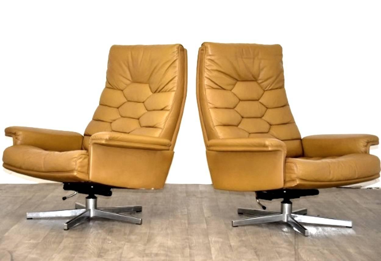 Discounted airfreight for our US and International customers ( from two weeks door to door) 
We bring to you to you an ultra-rare and highly desirable pair of De Sede Executive swivel lounge armchairs. Designed by Robert Haussmann and built in the