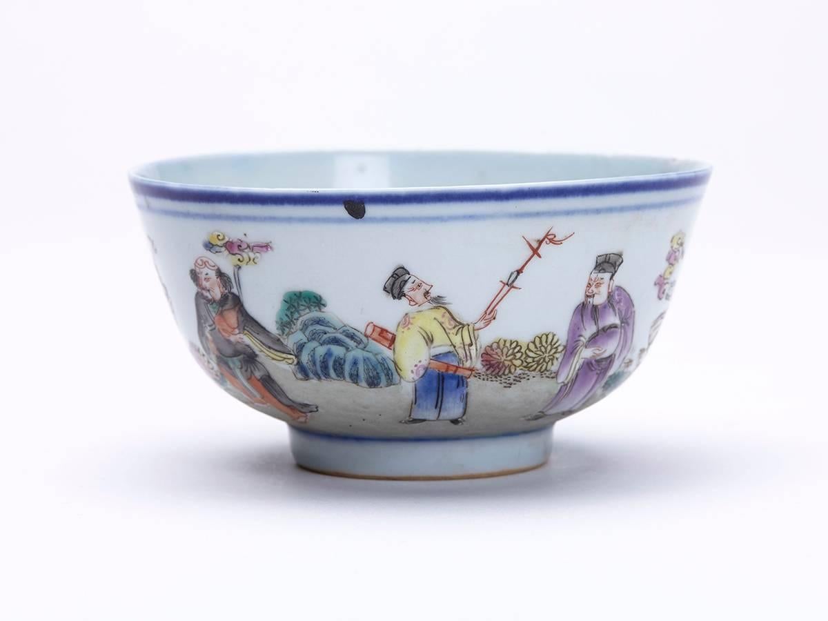 A stunning and exceptionally painted antique Chinese Guangxu porcelain bowl painted with numerous figures in various occupation within a continuous landscape. The small rounded bowl stands on a narrow rounded foot and is hand-painted in polychrome