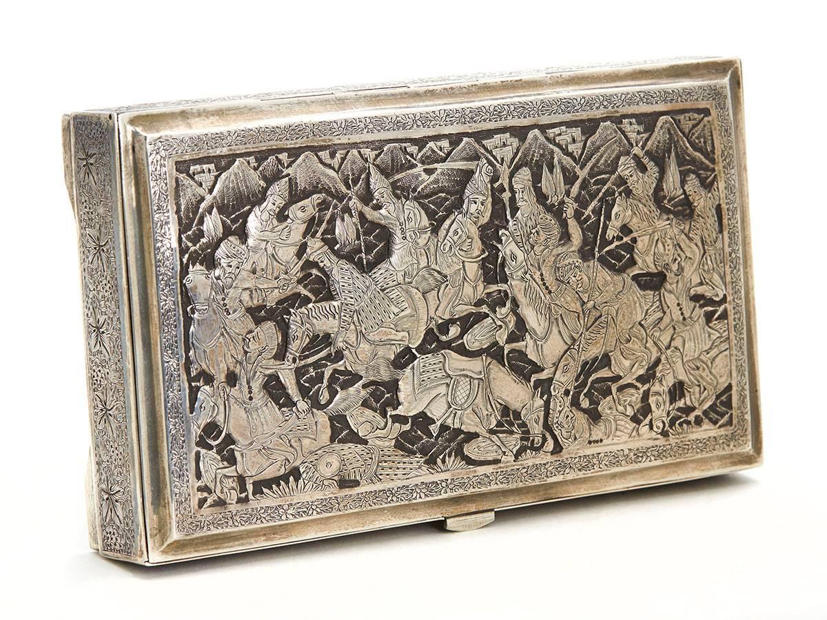 A rare and exceptional antique Northern Iranian silver casket decorated in relief with a battle scene and believed to date from the latter 19th century. This stunning quality silver casket is of 84 quality (Russian influence) silver and is