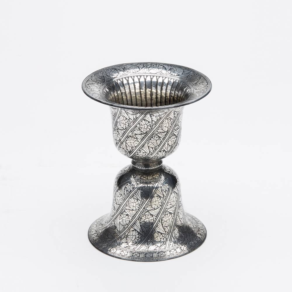 A very fine antique Indian Bidriware spittoon of bell shape mounted on a bell shaped base with floral silver inlaid banding. The spittoon is finely made and originates from Bidar, Deccan in South West India and historically the manufacture dates