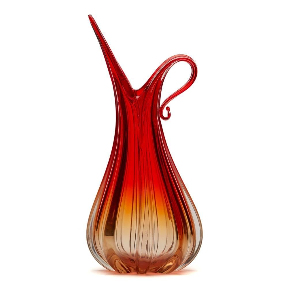 A stunning vintage Italian Murano art glass 'pitcher' shaped vase by Ercole Barovier & Toso. This large and striking piece is hand blown with thick moulded ribbing with a divided neck with one element raised to a point in the form of a spout and the