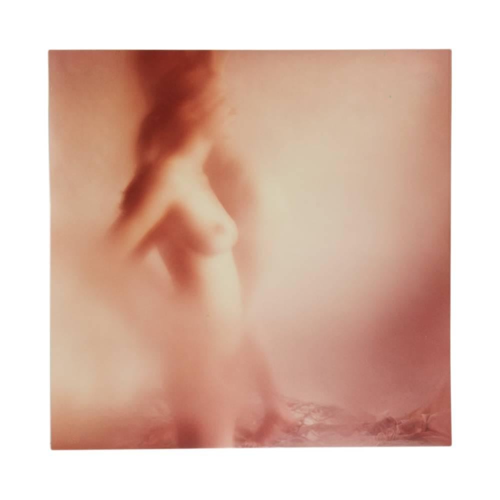 An interesting series of five limited edition vintage Bromoil silver gelatin prints of nudes by acclaimed German photographer Karin Székessy (1939-2010). The photographs, each of square form have a red colored bromoil tint and are signed in ink to
