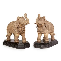 Pair of Vintage Asian Carved Wooden Elephants on Stands