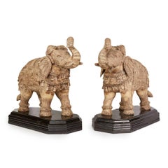 Pair of Vintage Asian Carved Wooden Elephants on Stands