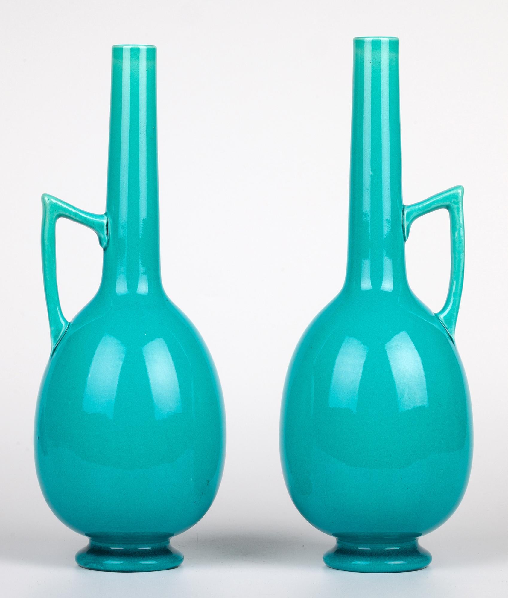 Late 19th Century Burmantofts Pair Turquoise Glazed Ewer Shaped Art Pottery Vases For Sale
