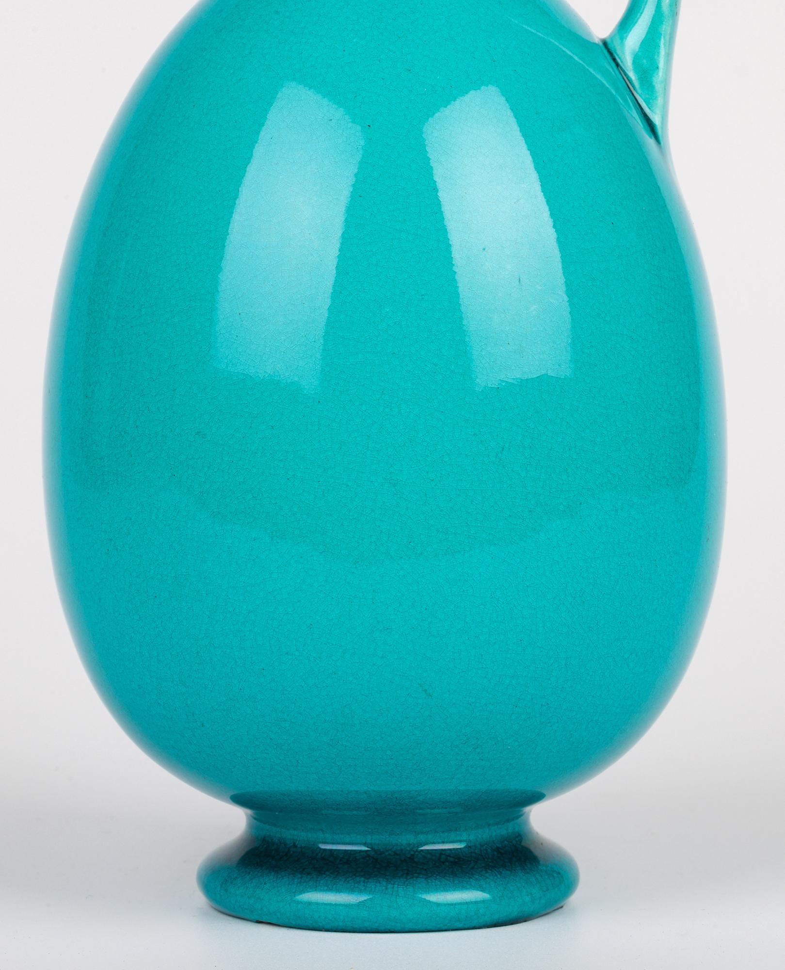 Burmantofts Pair Turquoise Glazed Ewer Shaped Art Pottery Vases In Good Condition For Sale In Bishop's Stortford, Hertfordshire