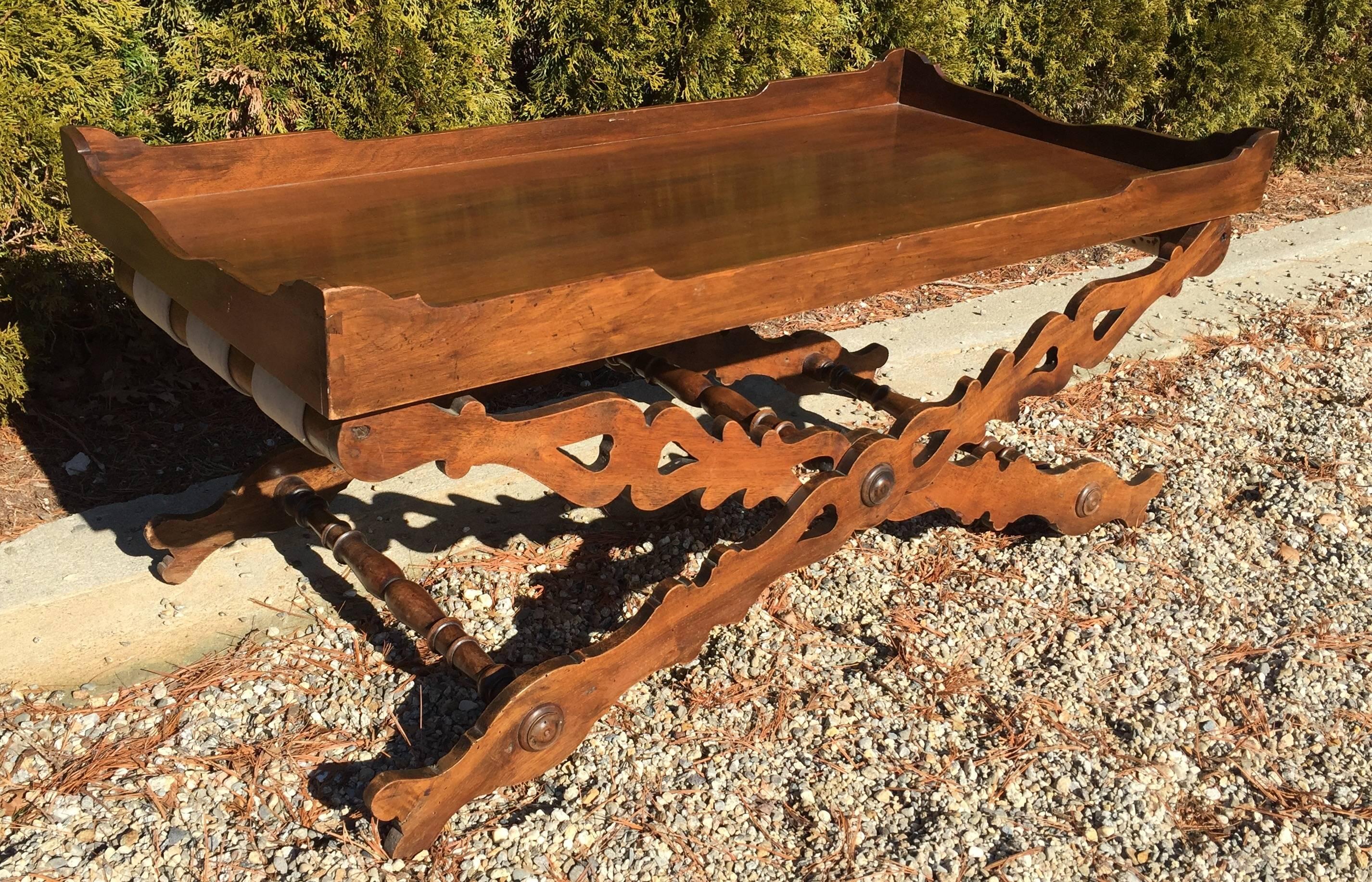 This early 19th Century English Walnut Butler's tray table was converted to a 47
