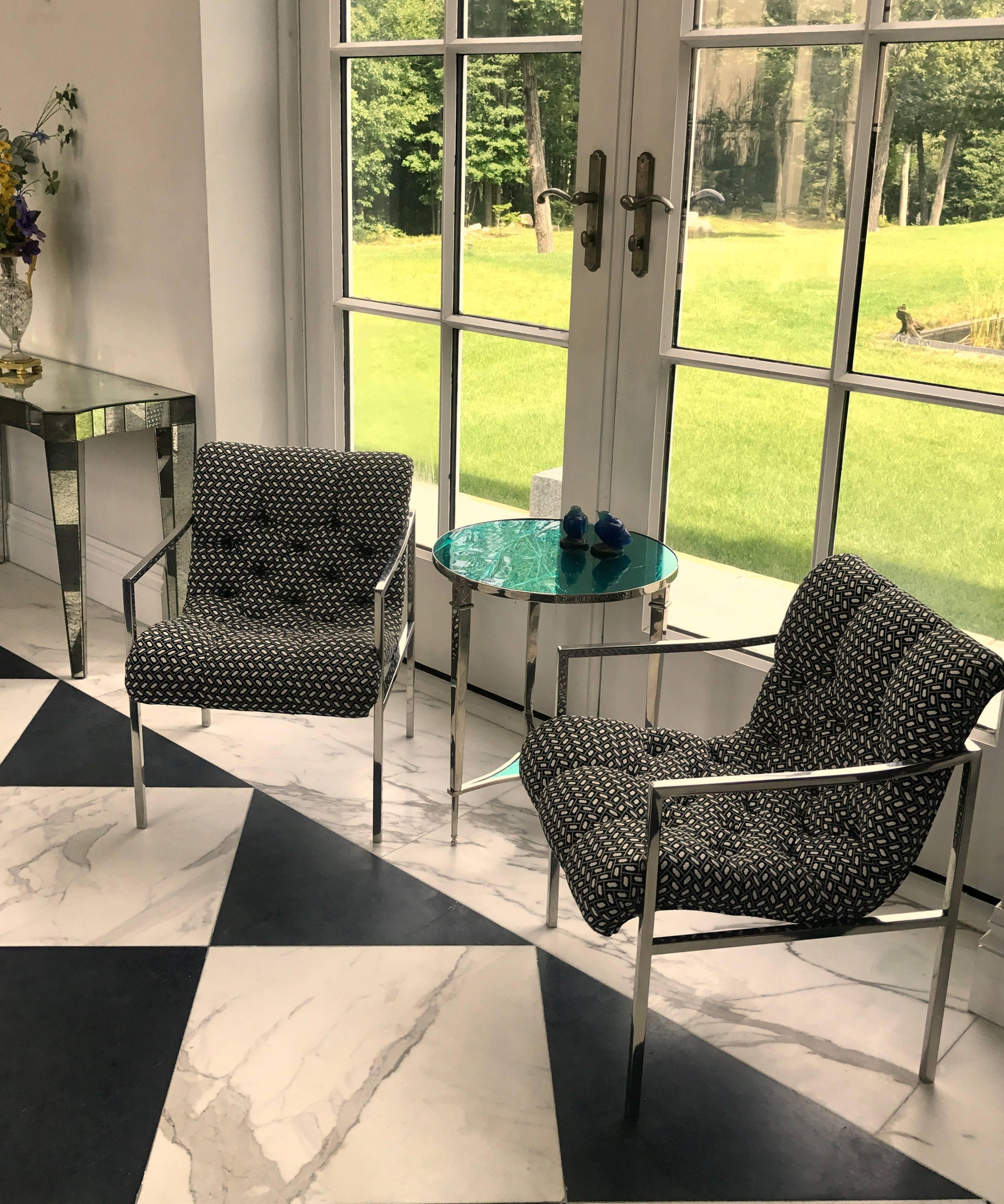 This stylish pair of chrome-plated steel Stow & Davis scoop lounge chairs is extremely comfortable. They came from a fine residence in Manchester by the sea, MA and were well taken care of. Even the upholstery is in great original condition.
They