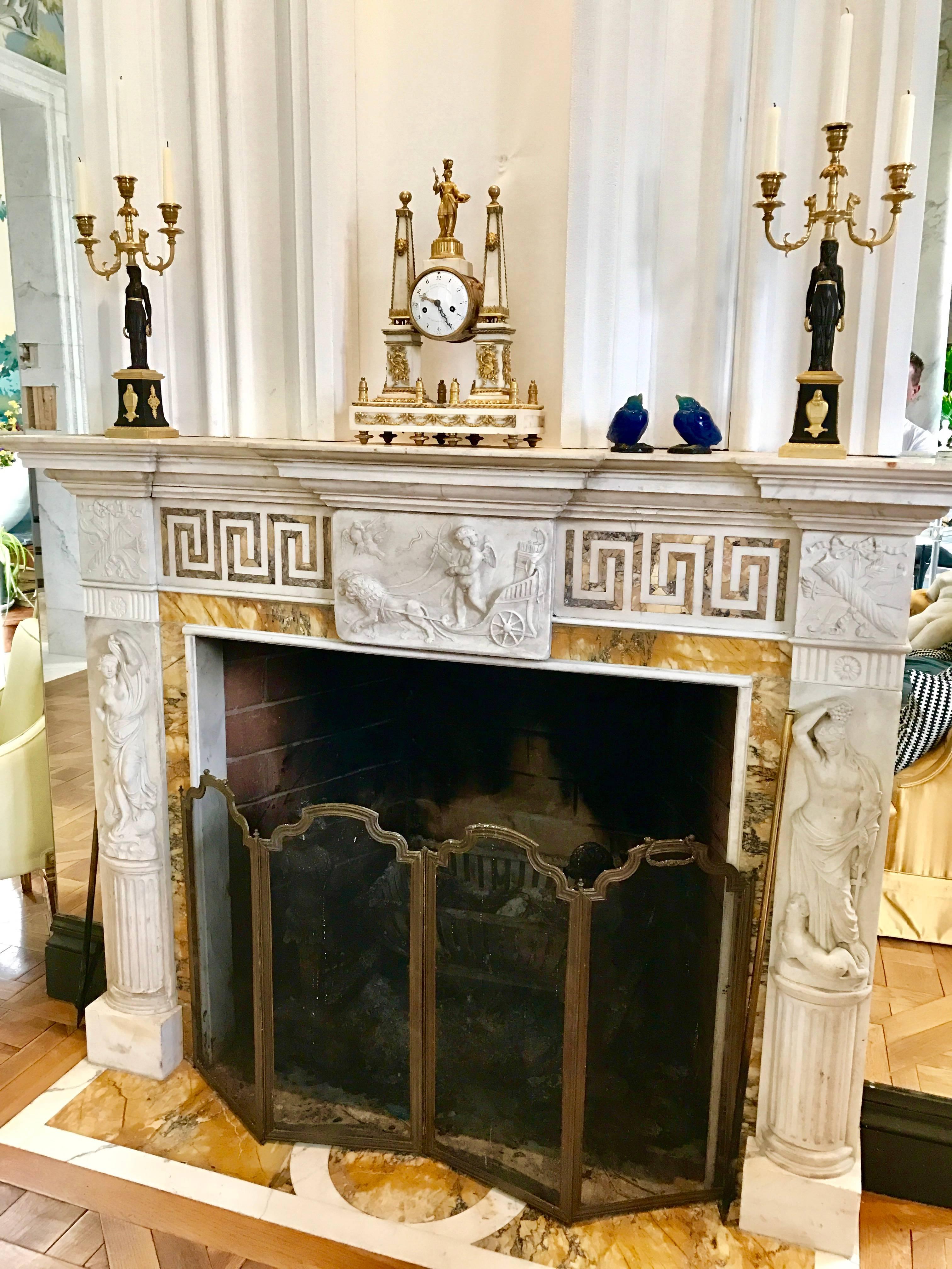 Most magnificent and imposing 18th century period statuary and richly colored and strongly grained Siena marble mantel piece. 
In the Roman style from the Newport, RI Collection of the legendary Heiress, Philanthropist, art collector and style icon