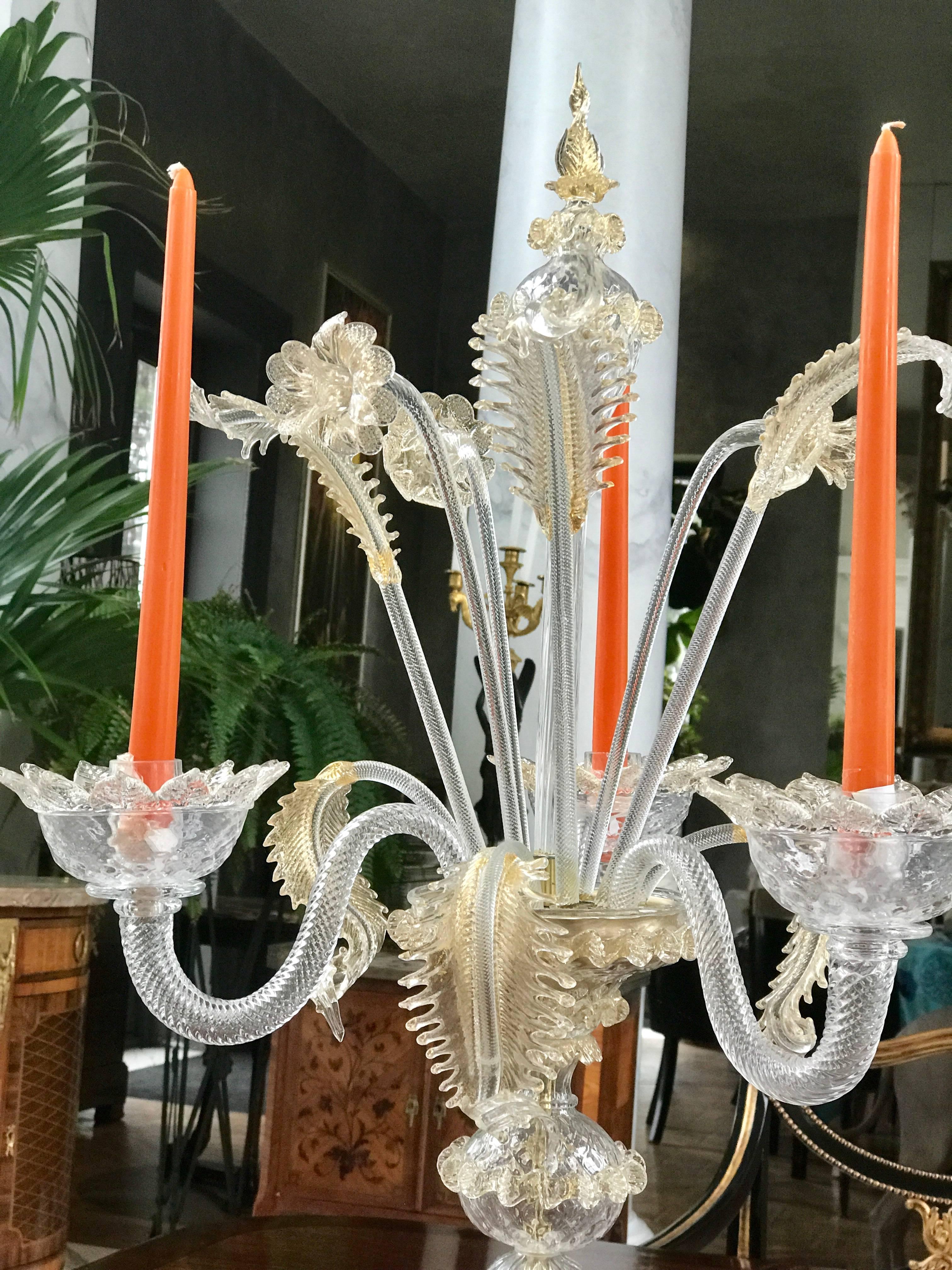 This whimsical Pair of Murano candelabra is handblown with 24-karat gold inclusions.
A show stopper on any dining room table or sideboard.
Signed by the Maker Fornasier Luigi
