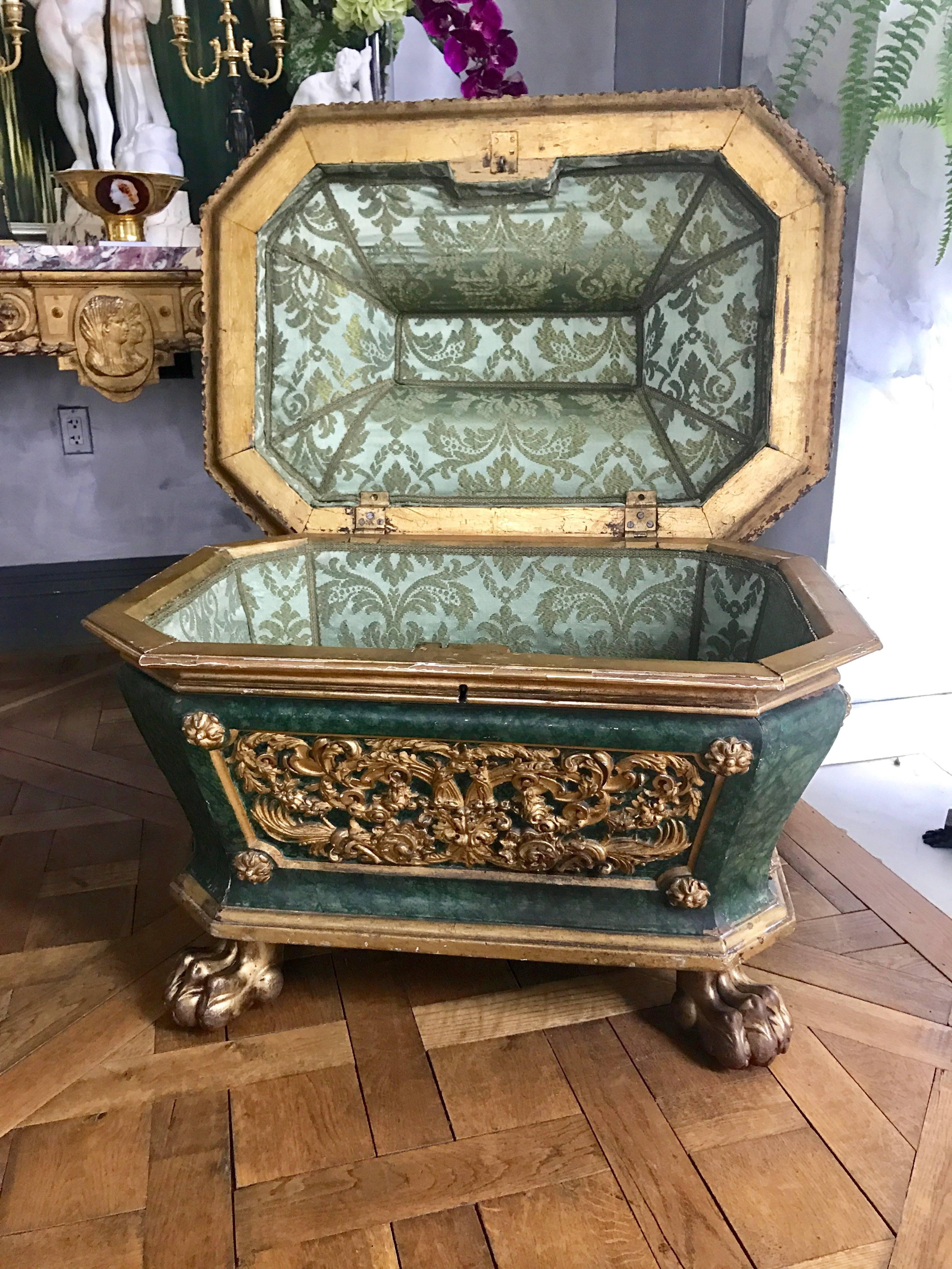 18th Century Italian Cellaret/Wine Cooler, Giltwood and Faux Malachite. This one of a kind cellaret is constructed out of walnut in the form of a cassone with a pagoda shaped hinged lid. The carvings are exquisite and retain their original gold, so