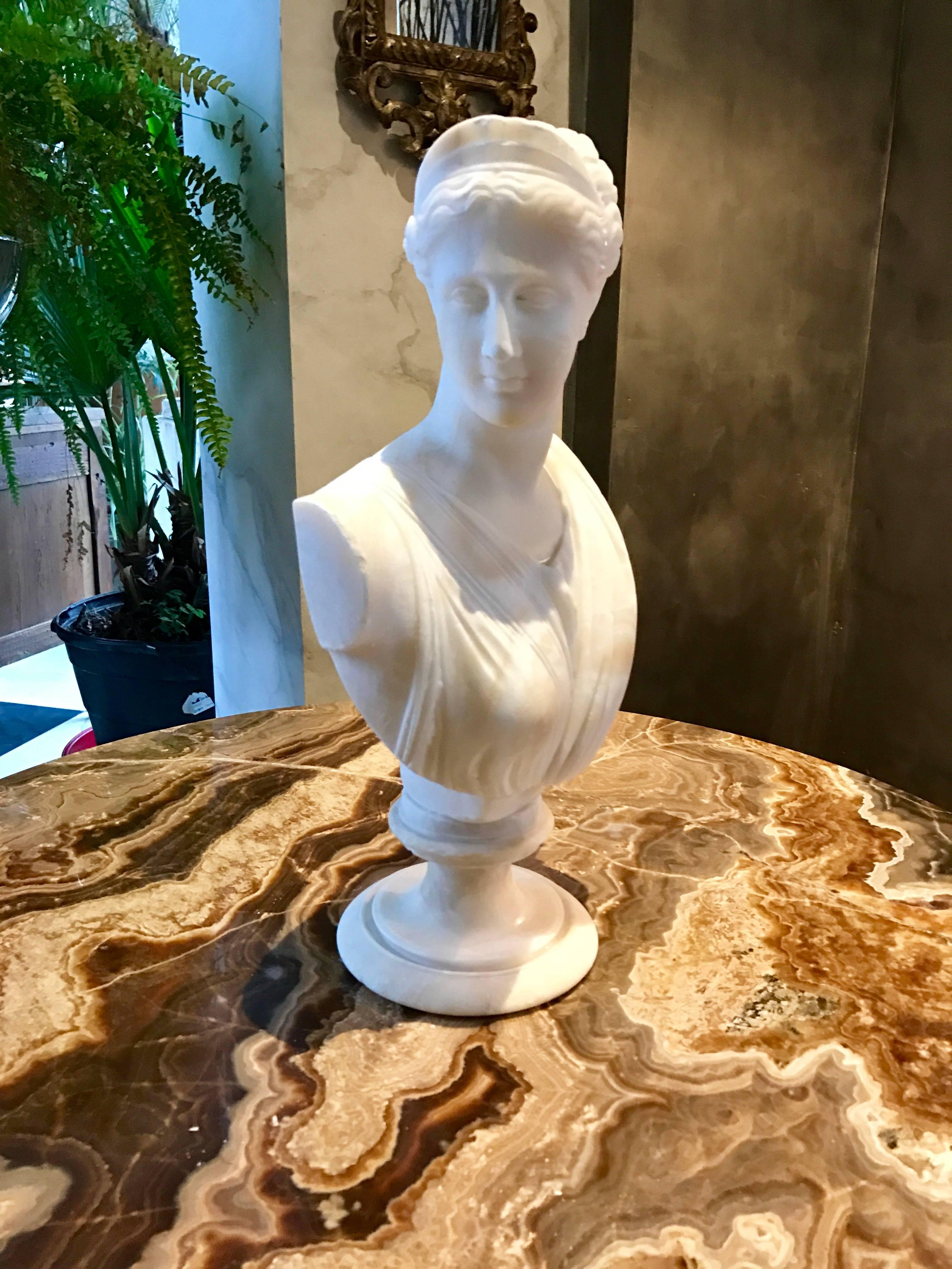 A fine example of the Bust of Goddess of the Hunt "Diana" after the antique original.
She was created by Italian Sculptor Giachelli in the Grand Tour period.
His signature is on the backside.
Made in Italy, 
in Alabaster circa 1860.
