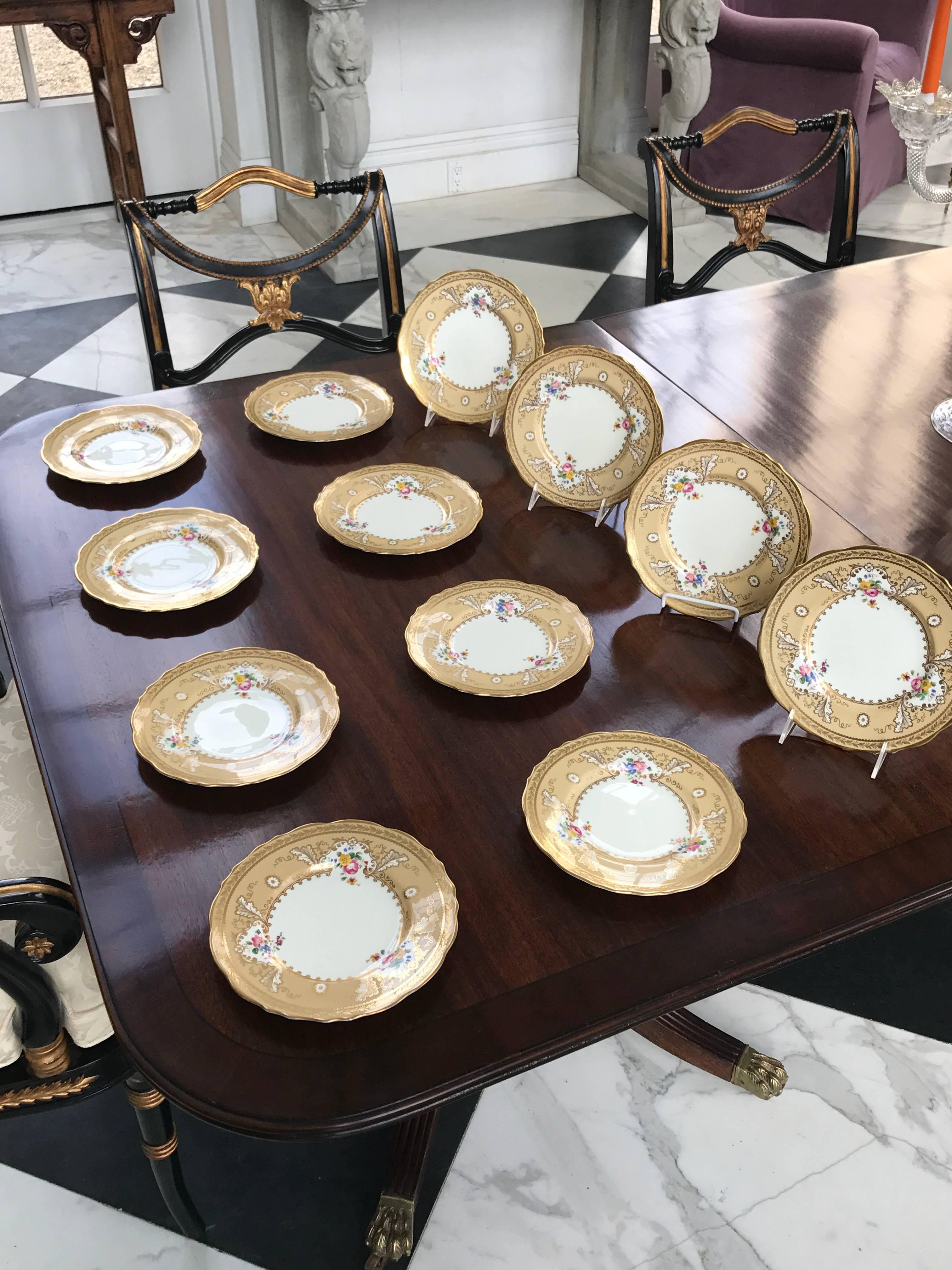 This tiffany set was produced by Cauldon in England, circa 1890.
Perfect for afternoon tea and cake this set of 12 Porcelain desert plates will enhance the experience.
The combination of hand-painted flowers and butterscotch custard border