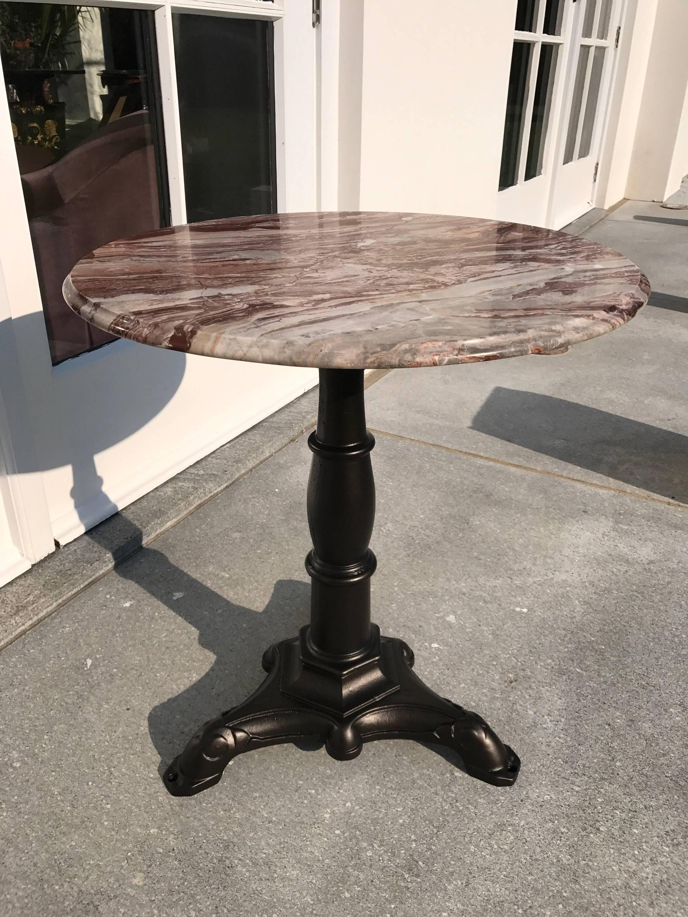 This beautiful late 19th century English side table is made of cast-iron, that we had powder coated in a dark bronze finish.
It has a later rouge marble top. 