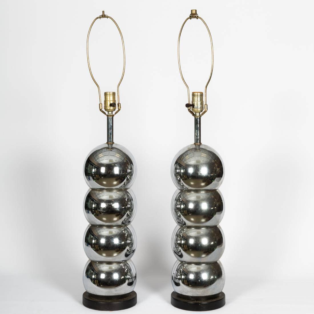 This is a gorgeous pair of Mid-Century Modern chrome lamps by Laurel.
The pair comes with replacement shades after the original.
American made circa 1960.