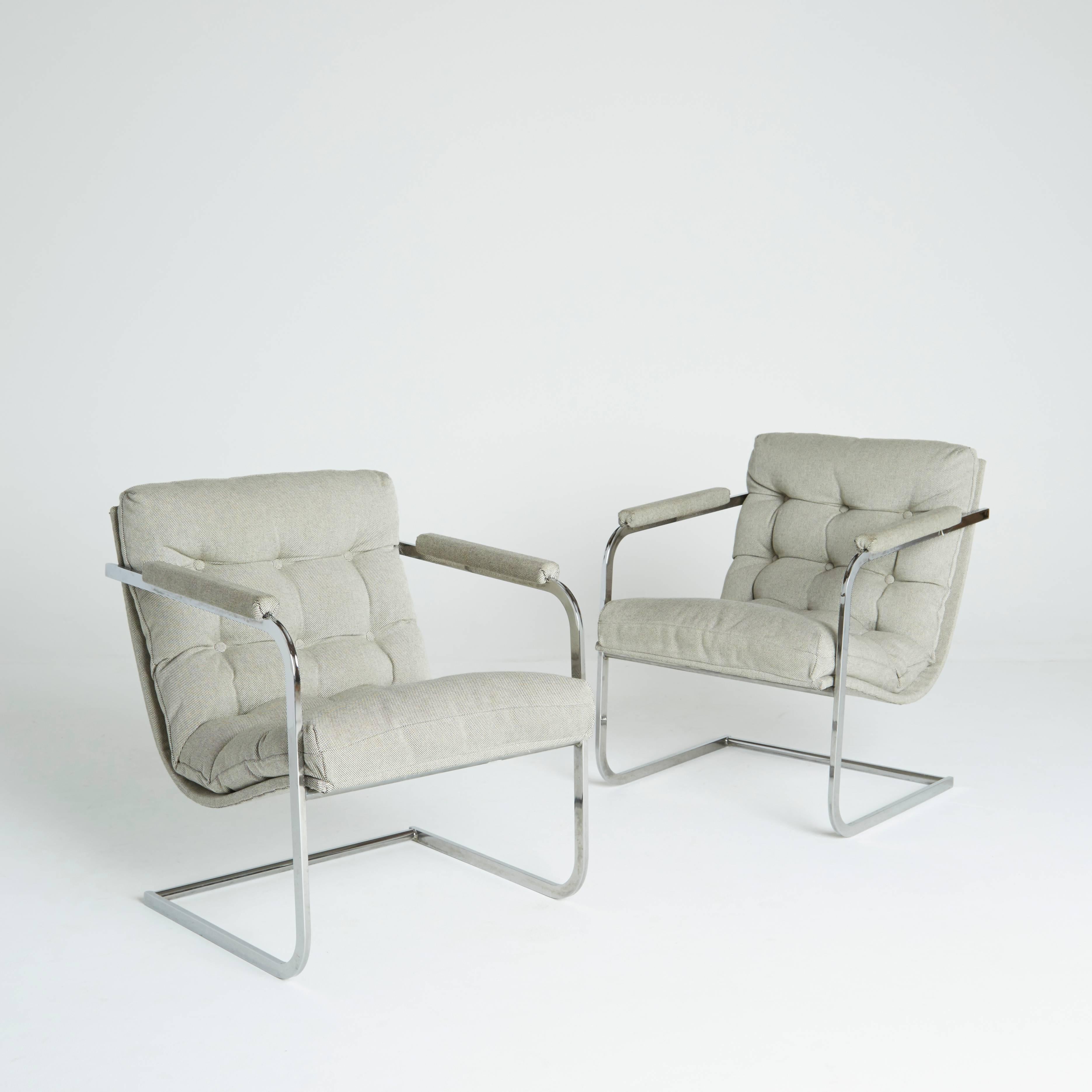 The vibrant tubular chrome frames on this beautiful set are sleek and rounded, creating a cantilevered support. Curving from the backrest into the seat, the chair features one continuous, comfortable cushion. Each armrest has an upholstered cushion