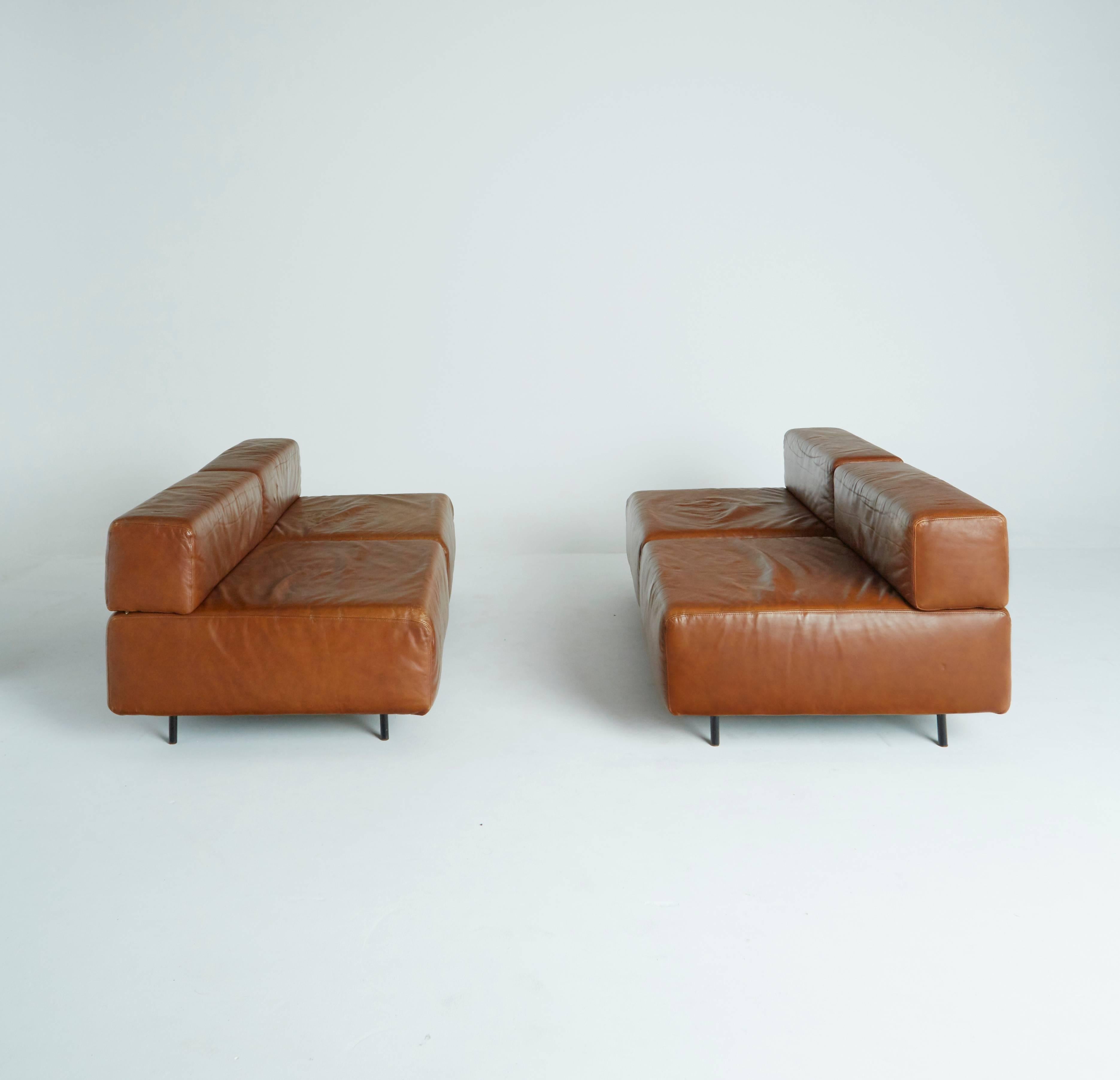 Designed by Harvey Probber, circa 1960, this set of 4 modular seating components can be arranged in endless ways around the room. The tan leather upholstery and low, relaxed stature make this lounge seating the epitome of cool.

Arrange the pieces