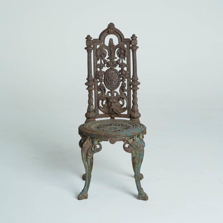 Patinated Victorian Iron Garden Chairs Circa 1930s At 1stdibs These Cast Iron Garden Chairs Are Ornate And Regal From Top To Bottom Tall