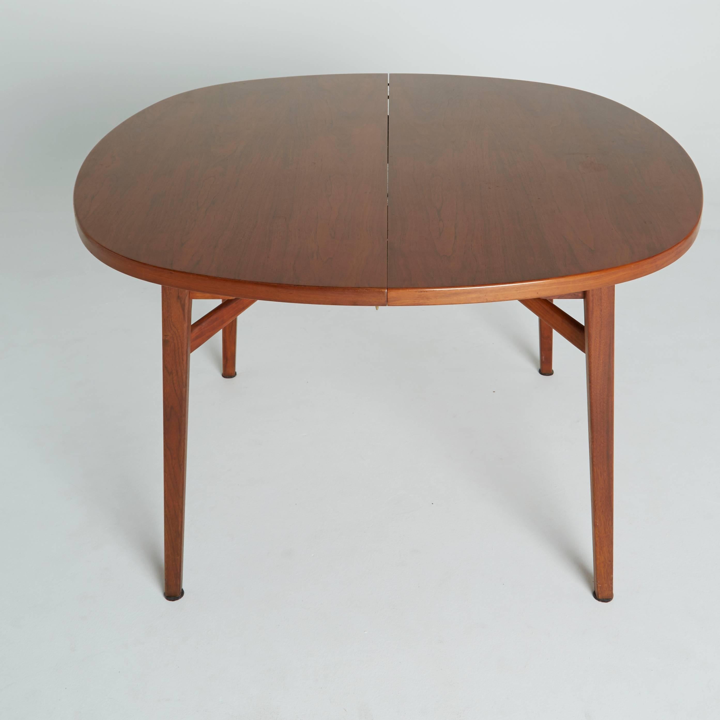 When compact, this round Jens Risom dining table is the perfect size for a quaint breakfast nook, for gaming and for a dinner for your family and friends. Included are three (3) leafs, so this versatile table has three more size settings to