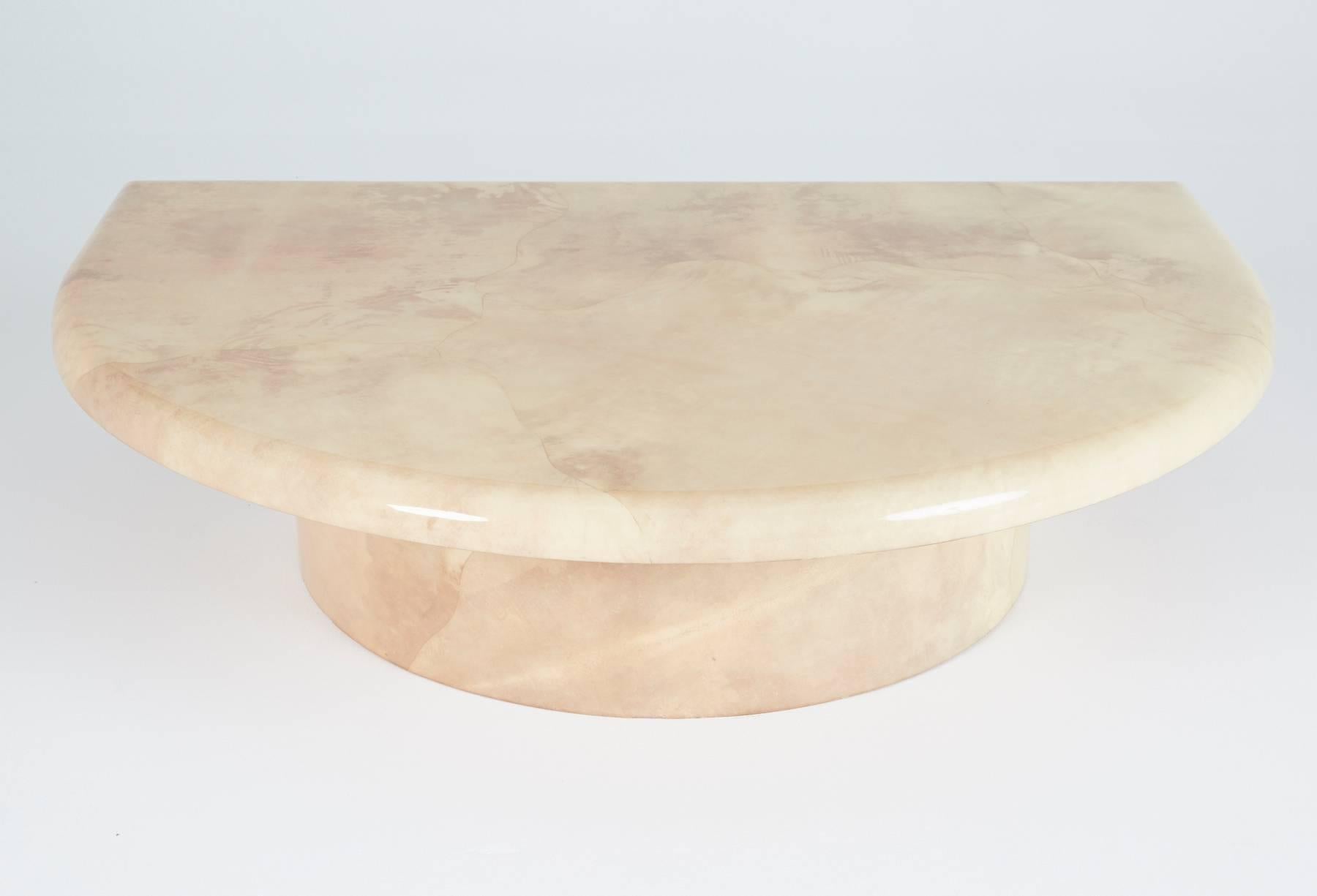 If you're looking for a unique and opulent design around which to congregate, look no further. This extraordinary semicircle table is a custom creation by Steve Chase circa 1970s and its large stature is offset by the soft details of the table so