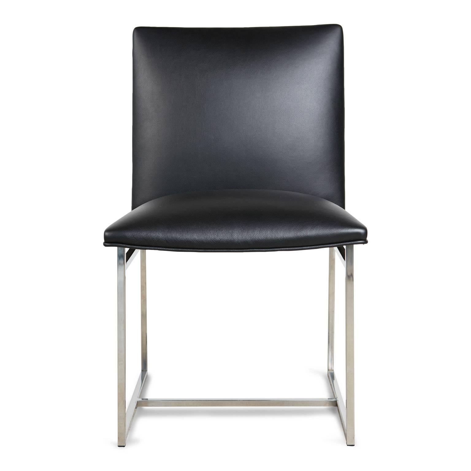 Comprised of a structural, angular, reflective chrome base with seat that has been newly upholstered in a high quality black, grained Edelman leather. The backs and seats have a slightly concave shape and are wonderfully comfortable along with being