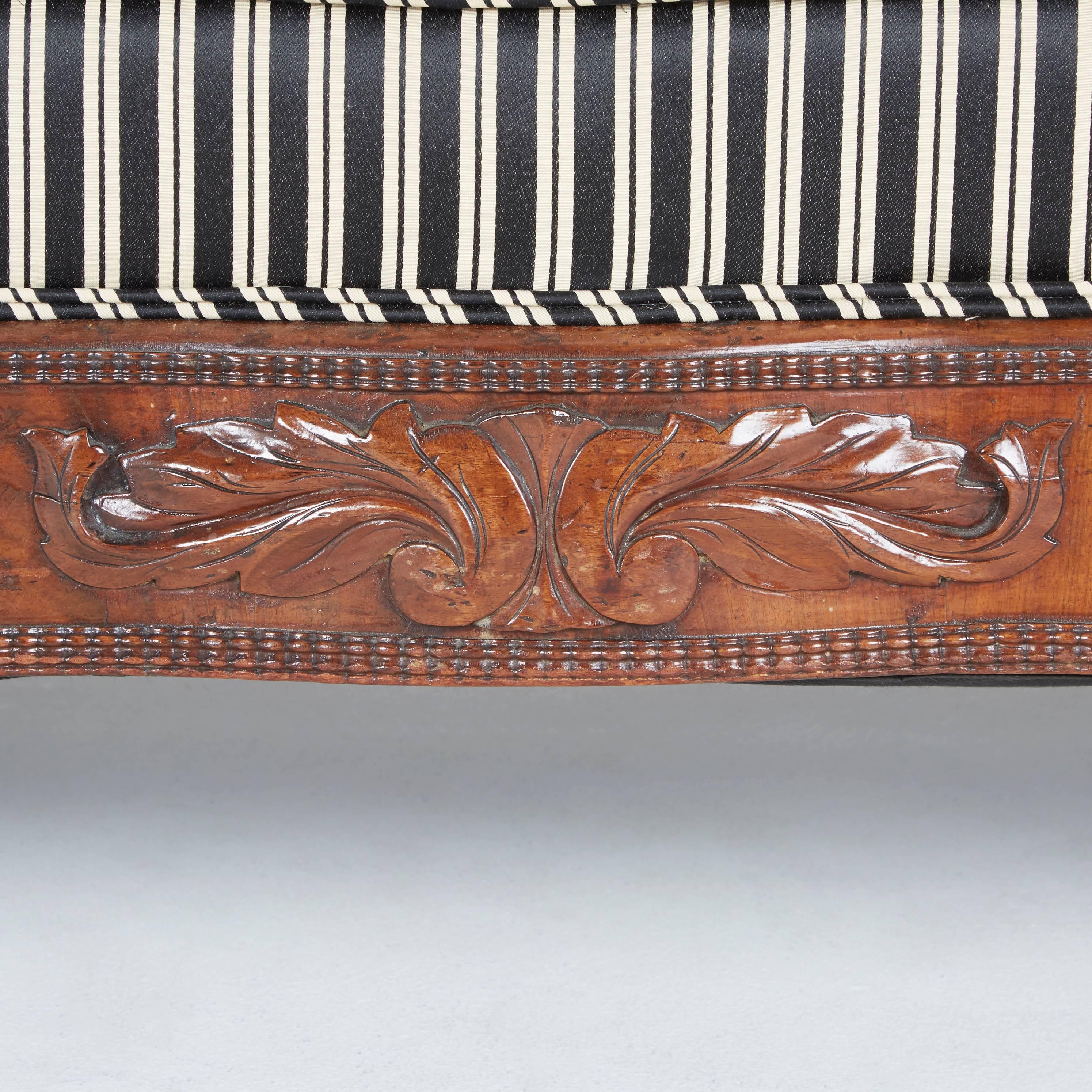 Victorian Rococo Revival Sofa, Carved Walnut with Striped Upholstery, circa 1880 1
