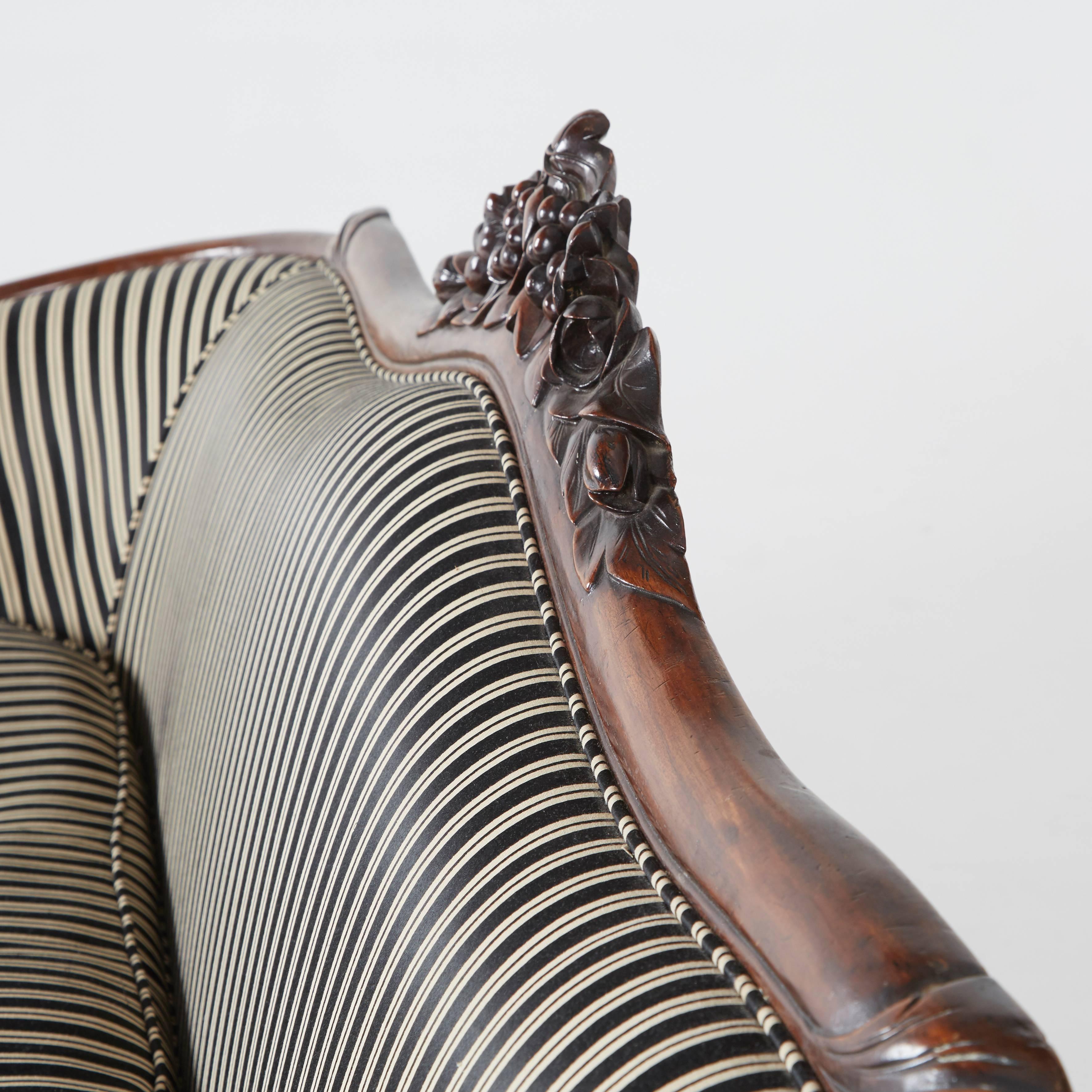 Victorian Rococo Revival Sofa, Carved Walnut with Striped Upholstery, circa 1880 4