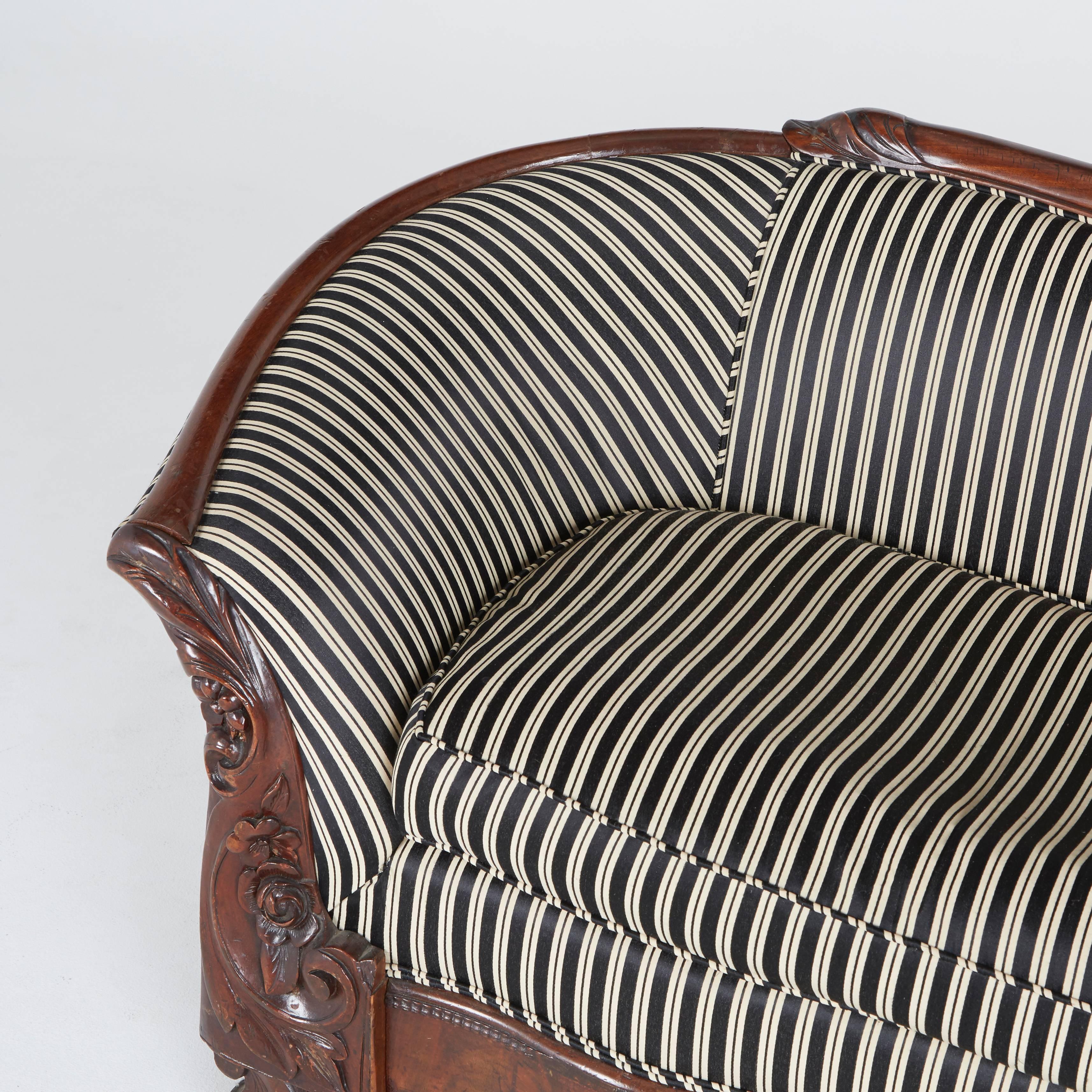 Victorian Rococo Revival Sofa, Carved Walnut with Striped Upholstery, circa 1880 2
