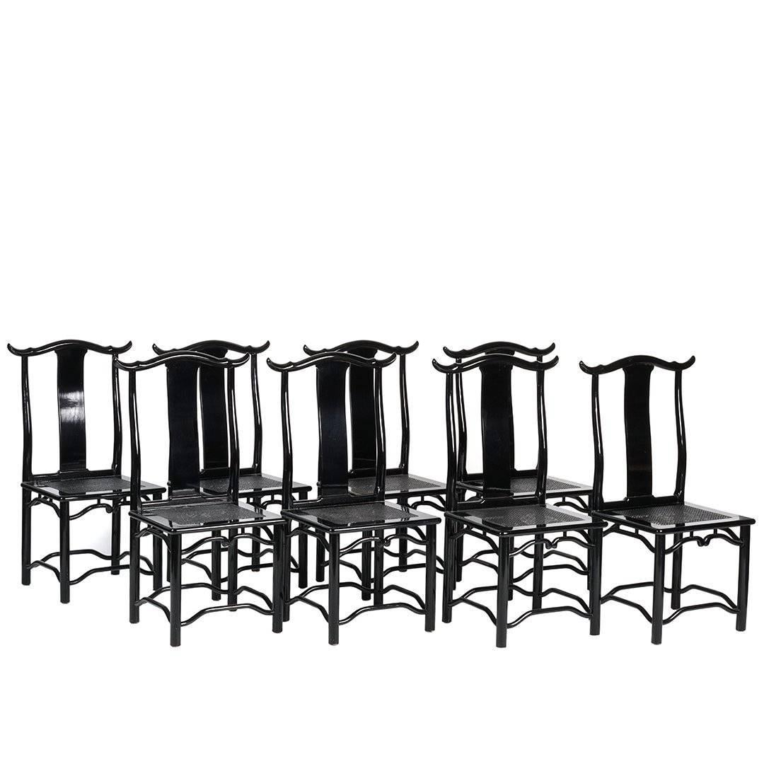A lustrous set of eight (8) Italian dining chairs with yoked top rails. These Italian Modern side chairs are a blend of the classic Chippendale style mixed with an Asian flair and finished in a high gloss black lacquer, making these chairs a