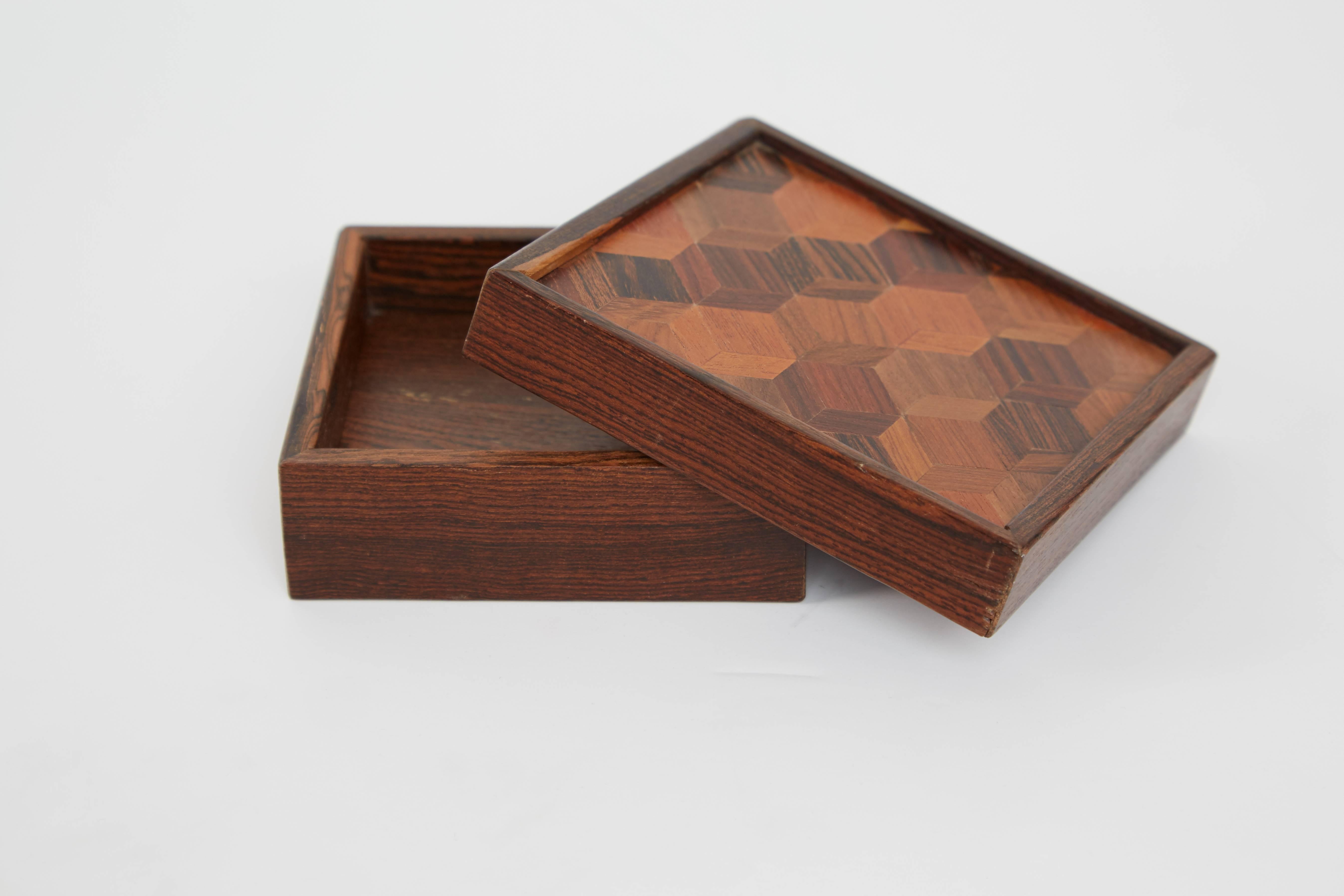 Exquisitely crafted petite box designed by Don Shoemaker for Señal of Mexico. Taking advantage of the expertise provided by Mexican artisans, Shoemaker founded Señal which produced utilitarian objects, such as this stunning example. 

This box