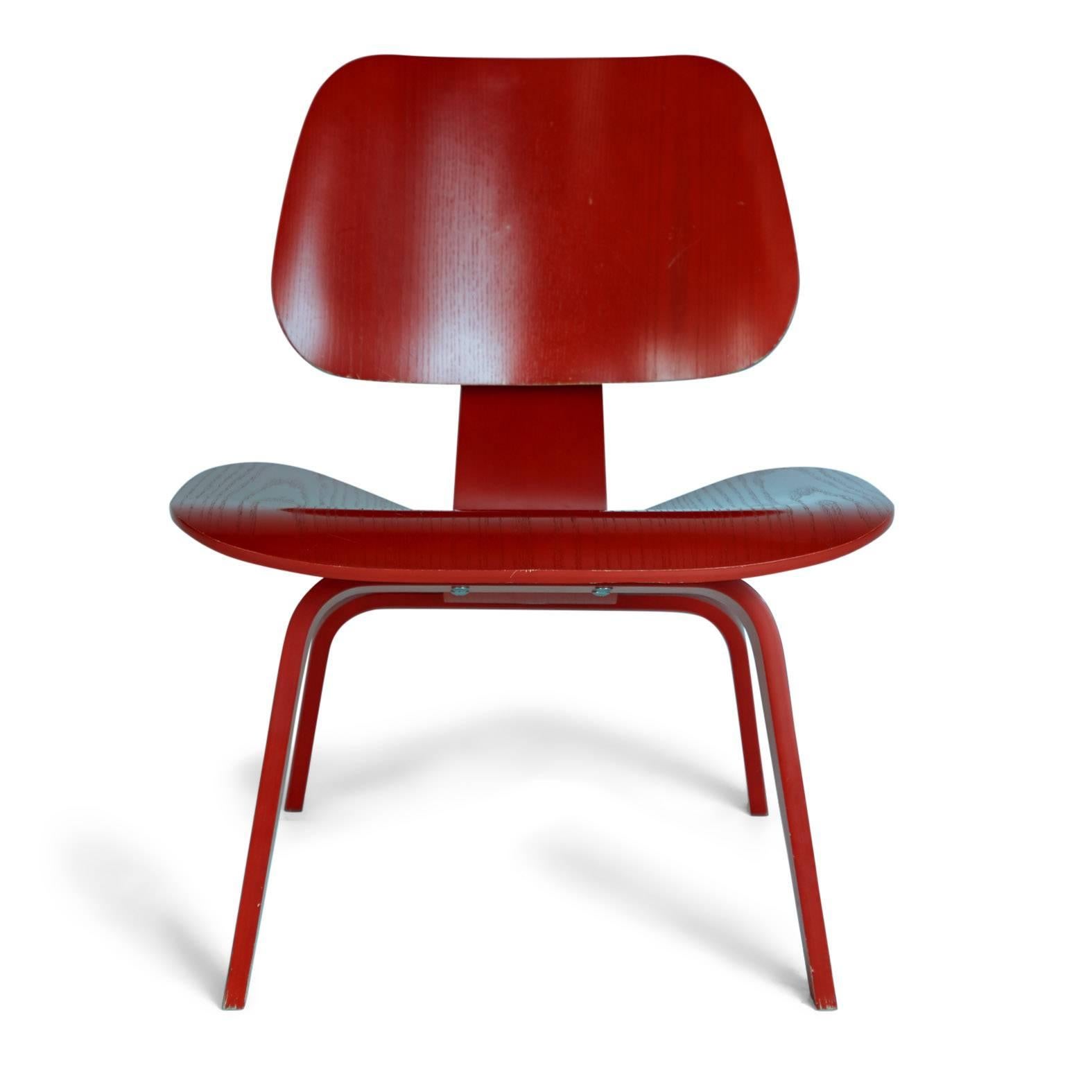 In 1946, these world renowned LCW or “Lounge Chair Wood” chairs, by Charles and Ray Eames for Herman Miller, were lauded by Time magazine as the best design of the 20th century. 

This LCW is comprised of low-slung, expertly crafted molded seat