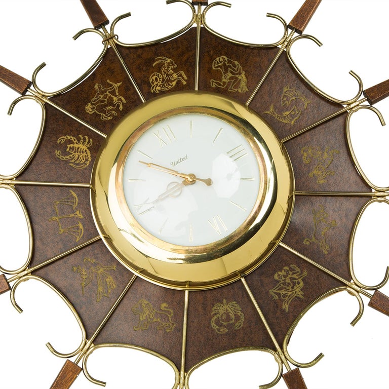 United Embossed Zodiac Sunburst Clock, circa 1950 For Sale at 1stDibs