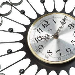 Welby Iron Sunburst Clock, circa 1950