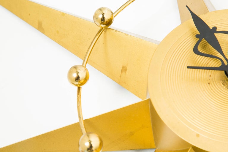 Spartus Starburst Clock with Circular Detail and Brass Spheres, circa