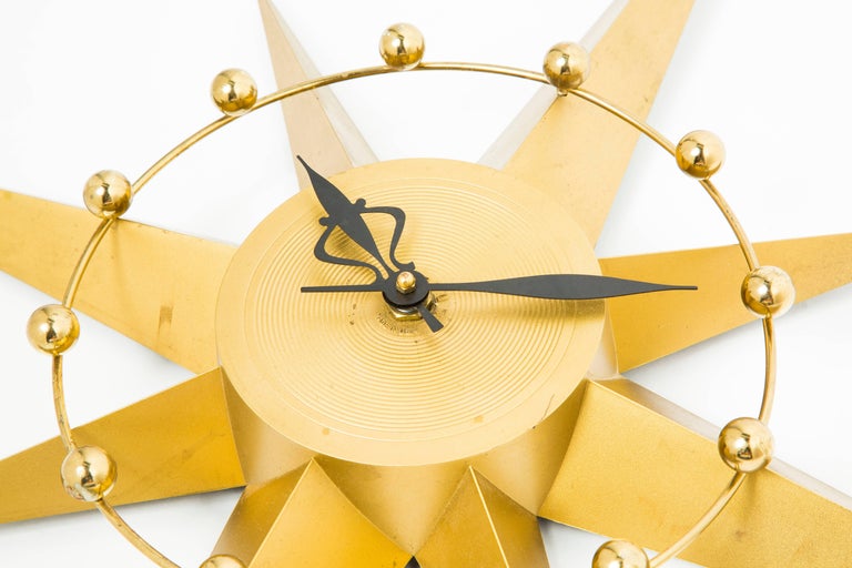 Spartus Starburst Clock with Circular Detail and Brass Spheres, circa