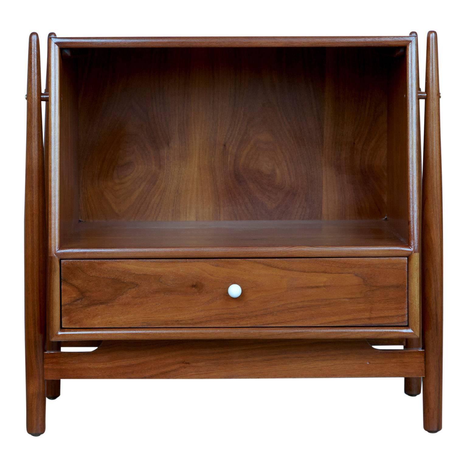 Exceptional pair of Mid-Century Modern nightstands or can also be used as side or end tables, designed by Kipp Stewart and Stewart McDougall as part of the Declaration line for Drexel furniture. This design being the most coveted and in-demand of