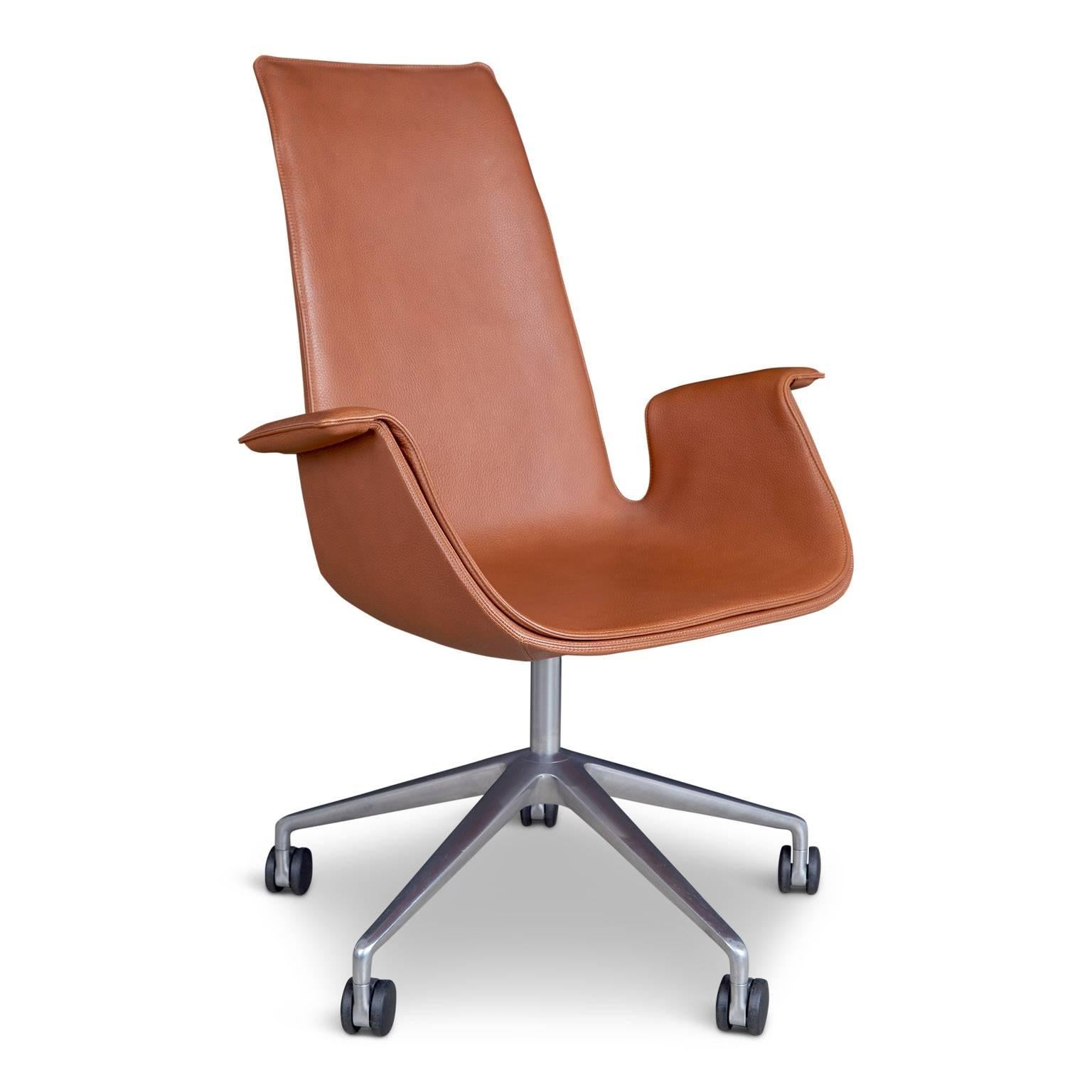 High back version leather 'Bird' chair, also commonly referred to as 'Tulip' chair, designed by Preben Fabricius and Jørgen Kastholm, manufactured in Germany by Walter Knoll.

This newer version of the famed armchair is fabricated from a