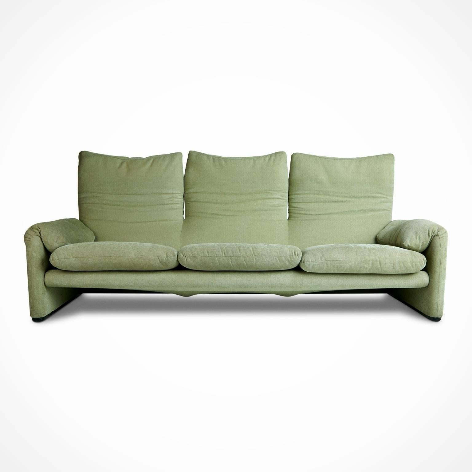 Vico Magistretti's award-winning 1973 Maralunga sofa for Cassina. The sofa provides a comfortable deep seat with low armrests and has adjustable backrests which, when unfolded, create a high back lounge style. This sofa has been upholstered in a