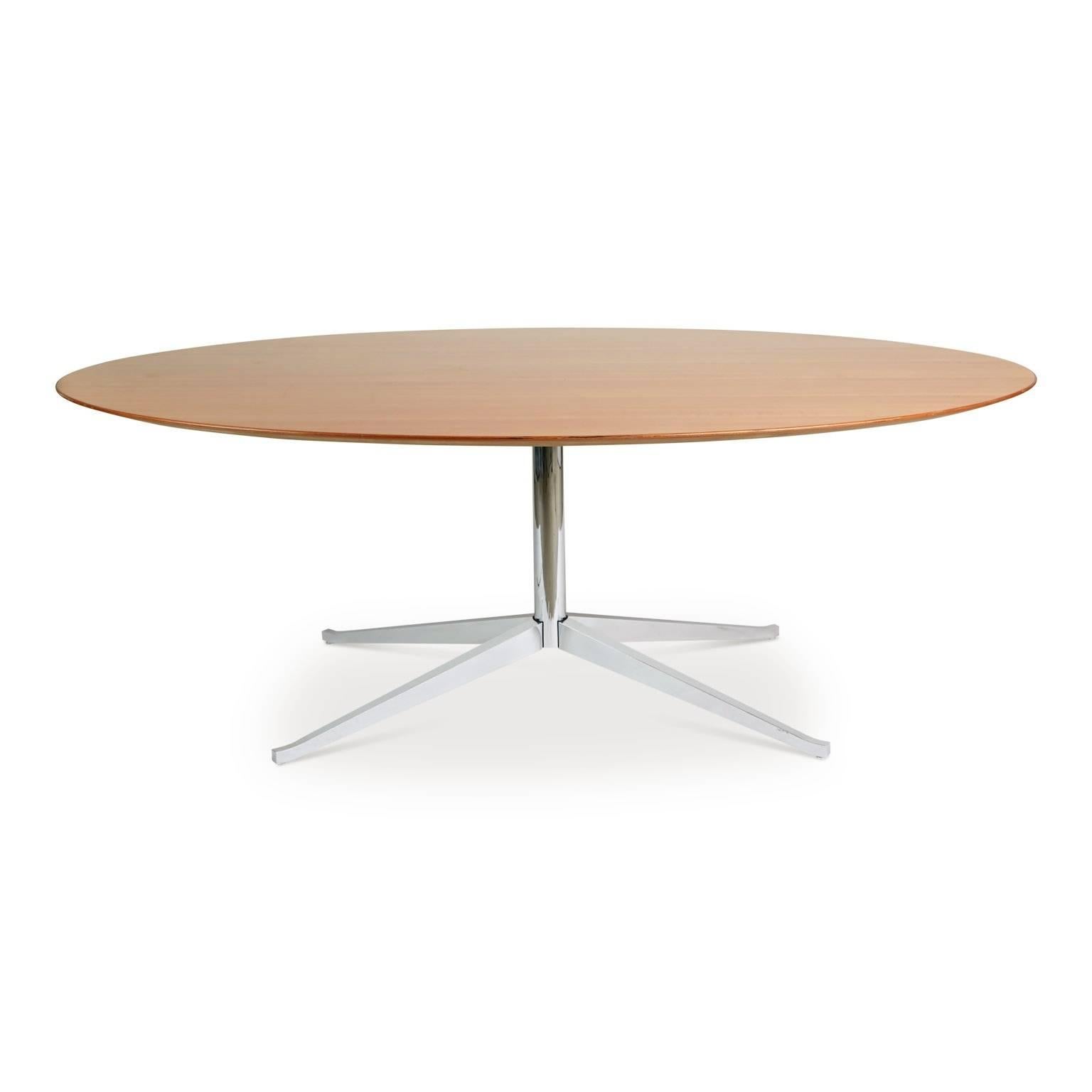 Expansive oval shaped table originally designed by Florence Knoll for Knoll International in 1961. This generously proportioned table comprises of a spacious oval shaped pearwood top finished with a knife edge. Both the frame and legs are fabricated