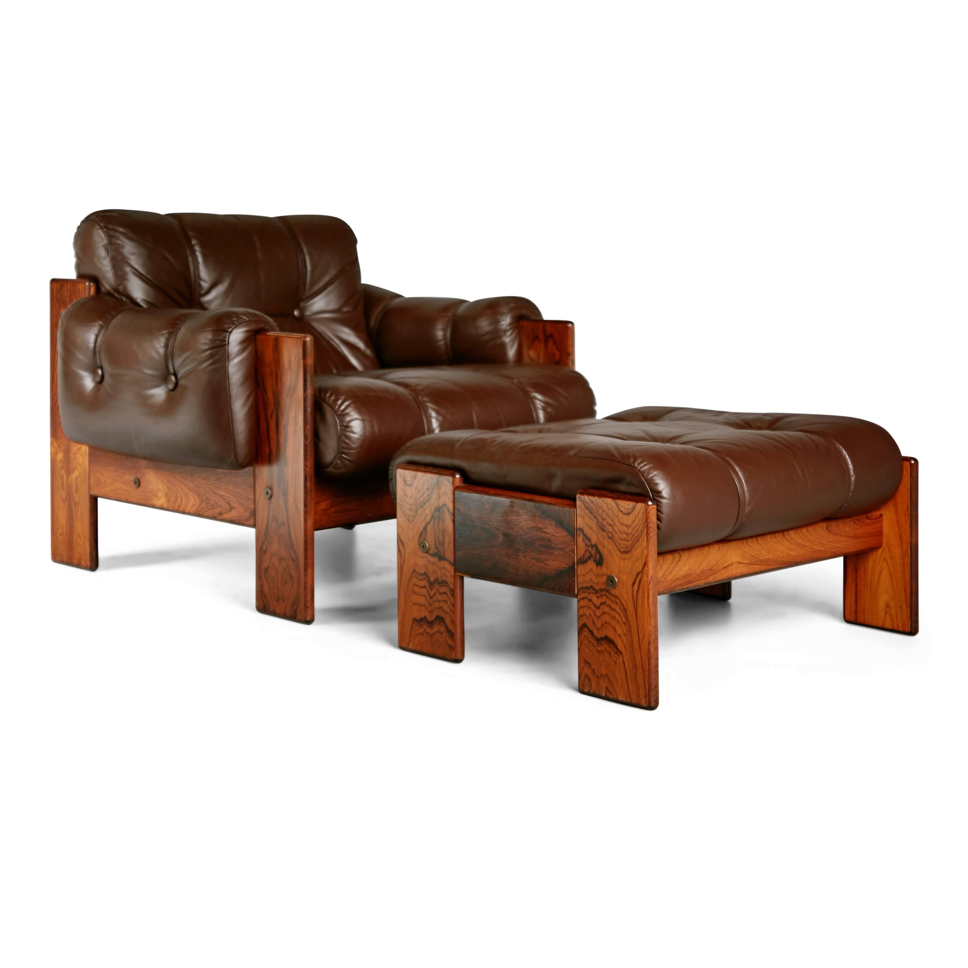 Wonderful lounge chair and matching ottoman by Kalustekiila, Finland. Featuring the original high quality tufted leather upholstery which has expertly cleaned and conditioned to the original rich brown color while still retaining the vibrant look of