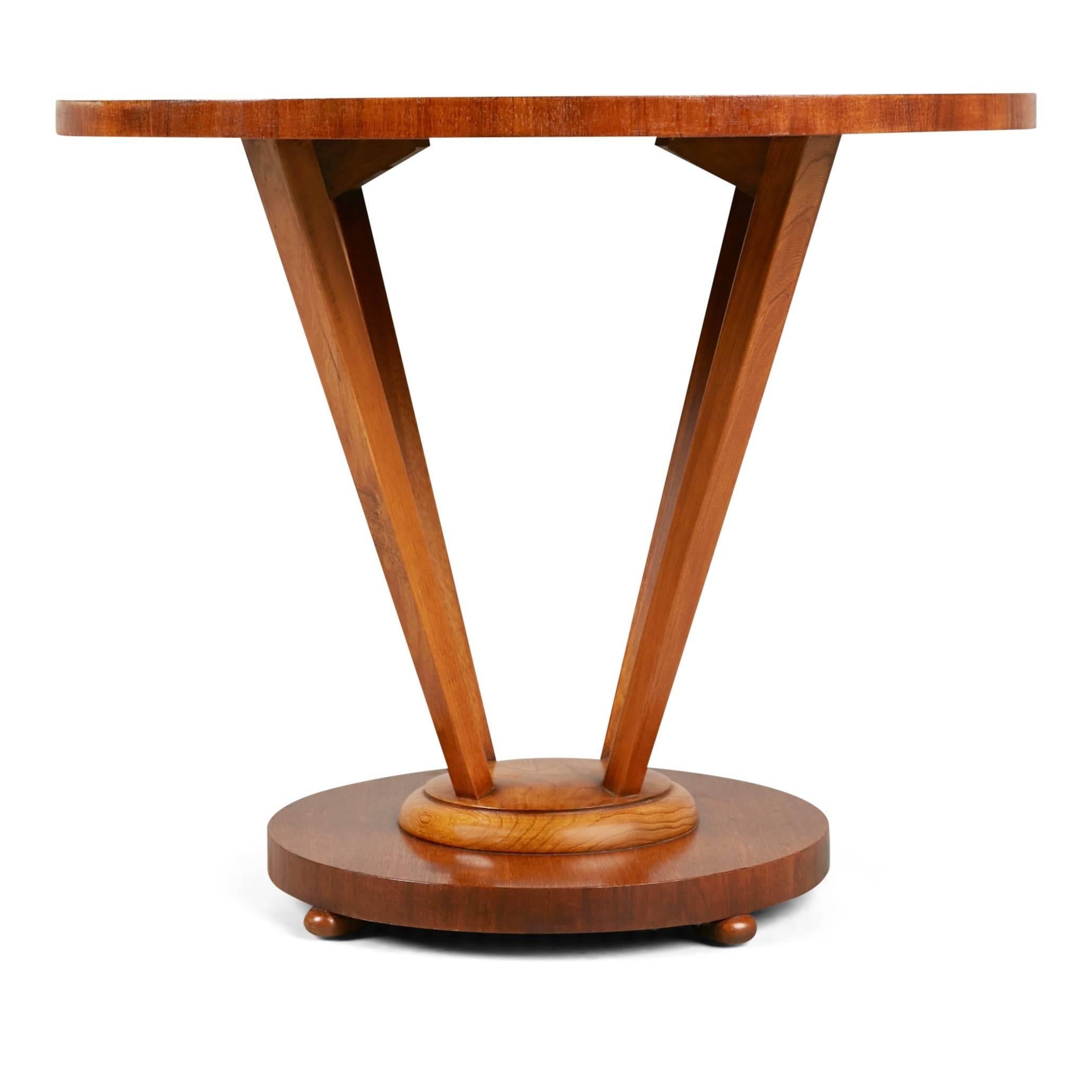 Occasional table by Lane, circa 1960. Fabricated from walnut and in the center of the surface there is a square segment of small tiles made up of shades of white with undertones of a soft subtle green. The circular top is connected to a plinth base