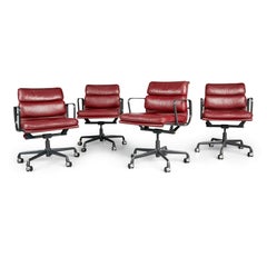 Charles Eames for Herman Miller Burgundy Soft Pad Management Chairs:: circa 1980