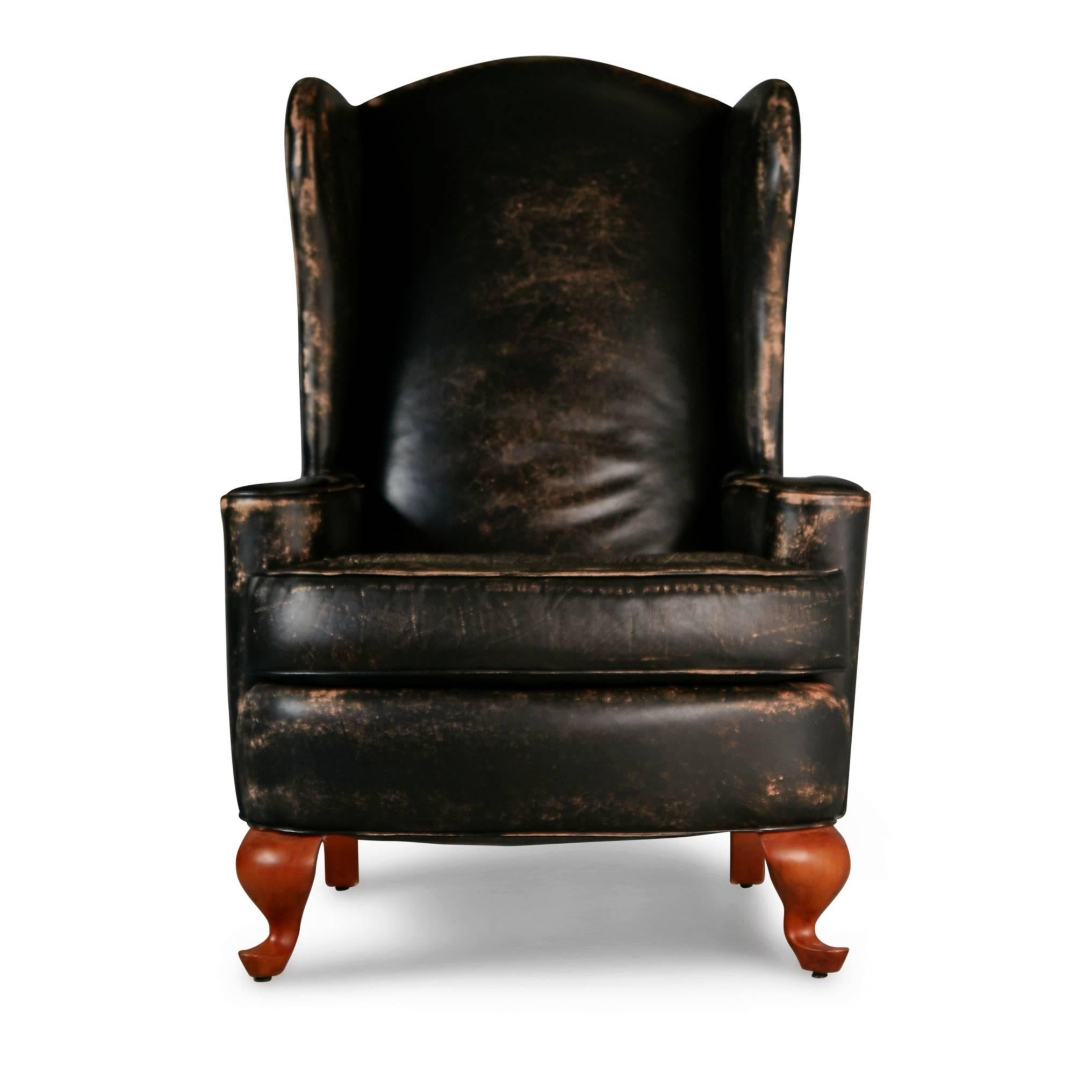 distressed leather chair and ottoman