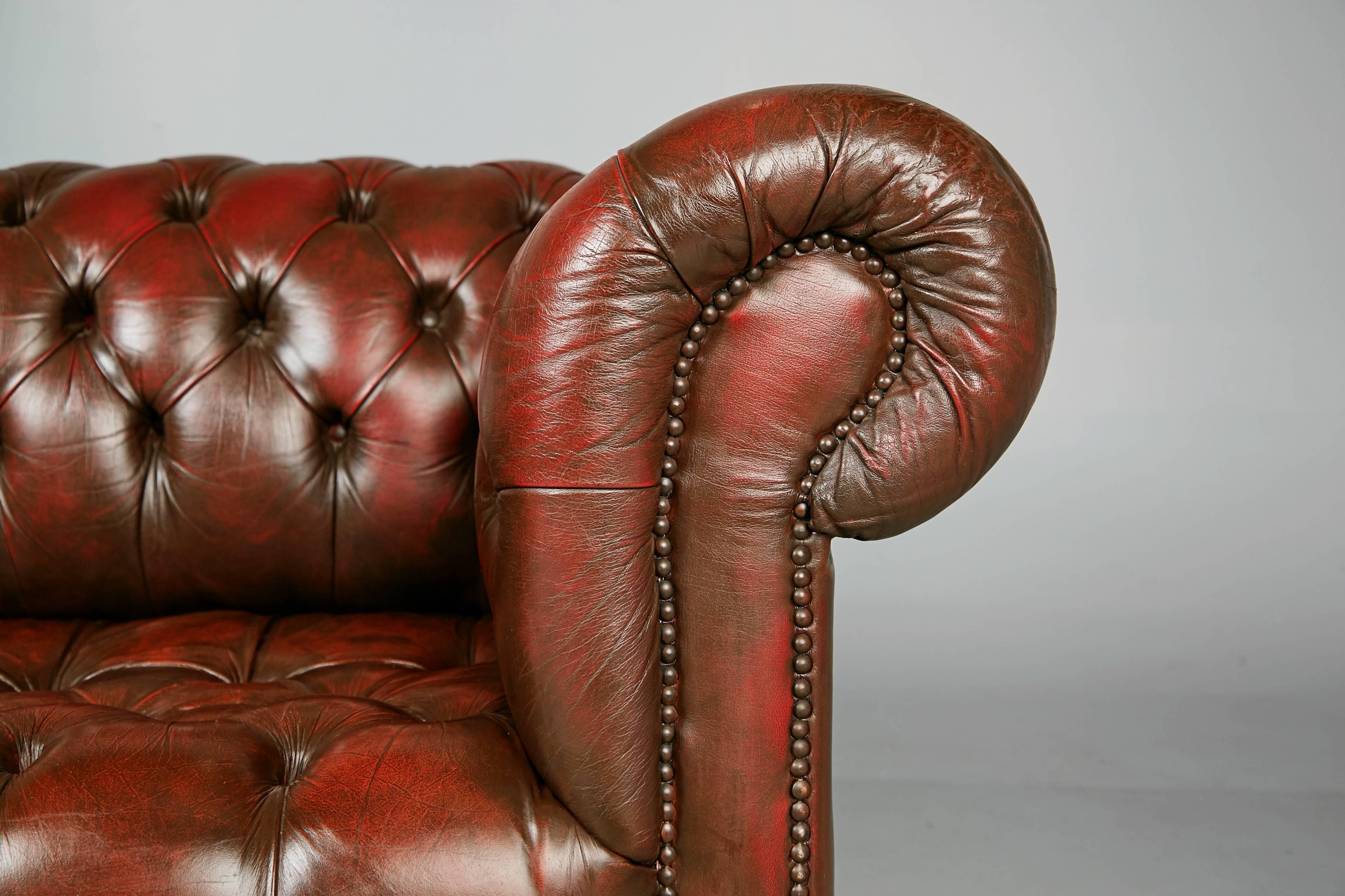 English Georgian Style Distressed Oxblood Leather Chesterfield Sofa, circa 1960 1