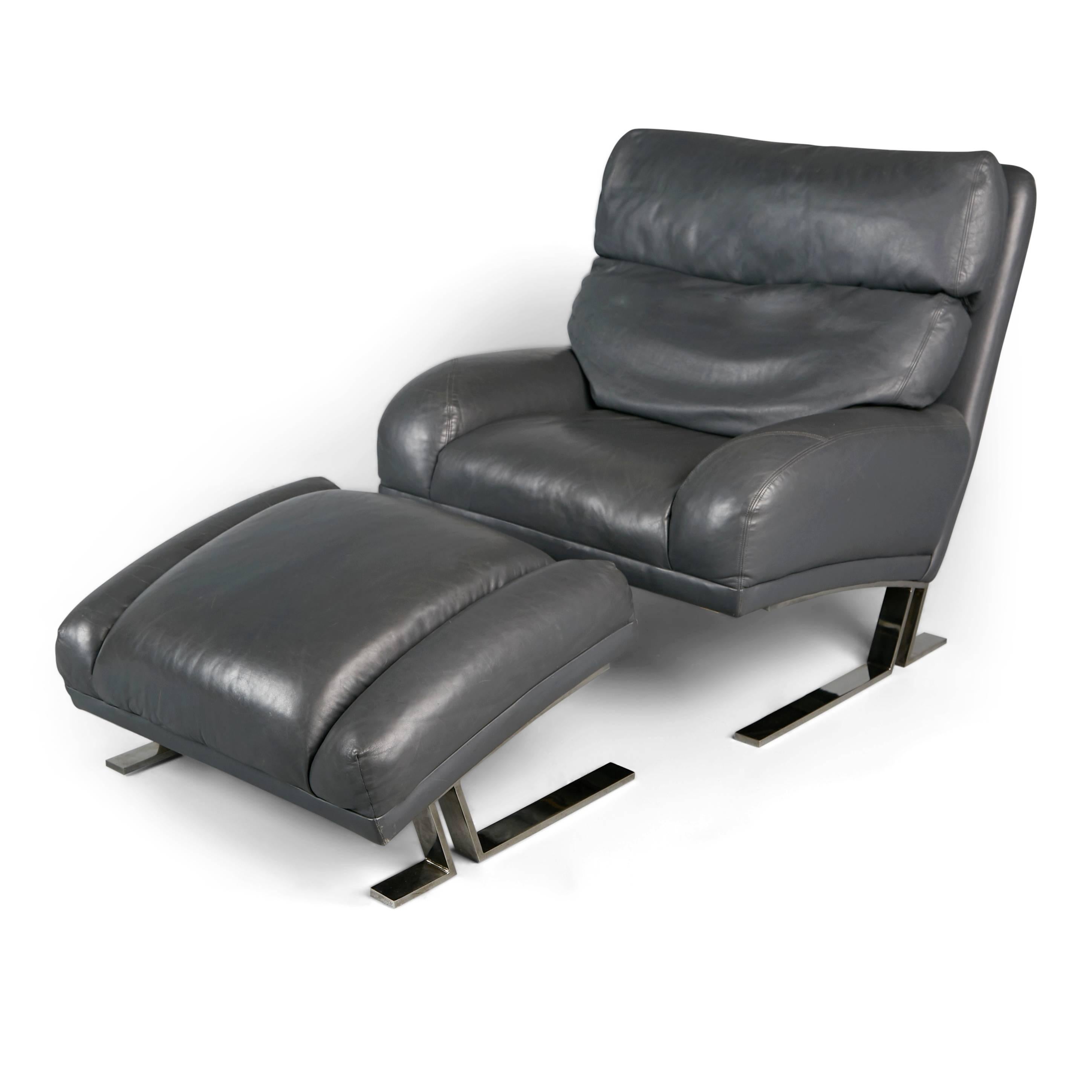 Larger-scale and vastly comfortable grey leather lounge chair and matching ottoman by Milo Baughman for Directional. This handsome pair is comprised of a sleek, minimal design favoring curved attributes with chrome cantilever legs supporting both
