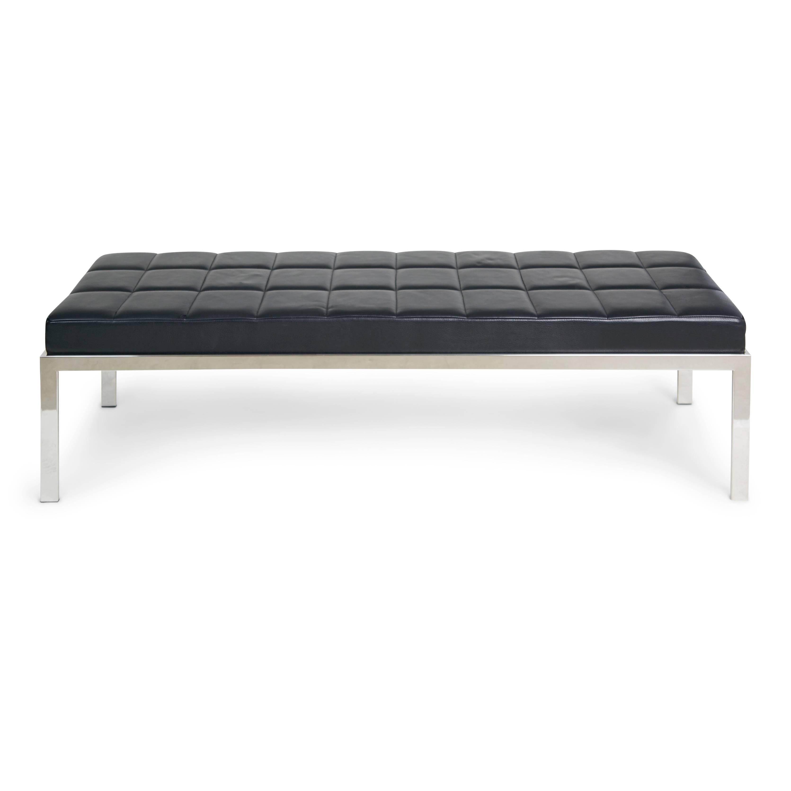 Sophisticated modern black leather and chromed steel bench from the Tribune Towers, Circa 1990. Well constructed seating with quality upholstered black leather.  In the style of Bertrand Goldberg.  

Excellent choice for a creative office or modern