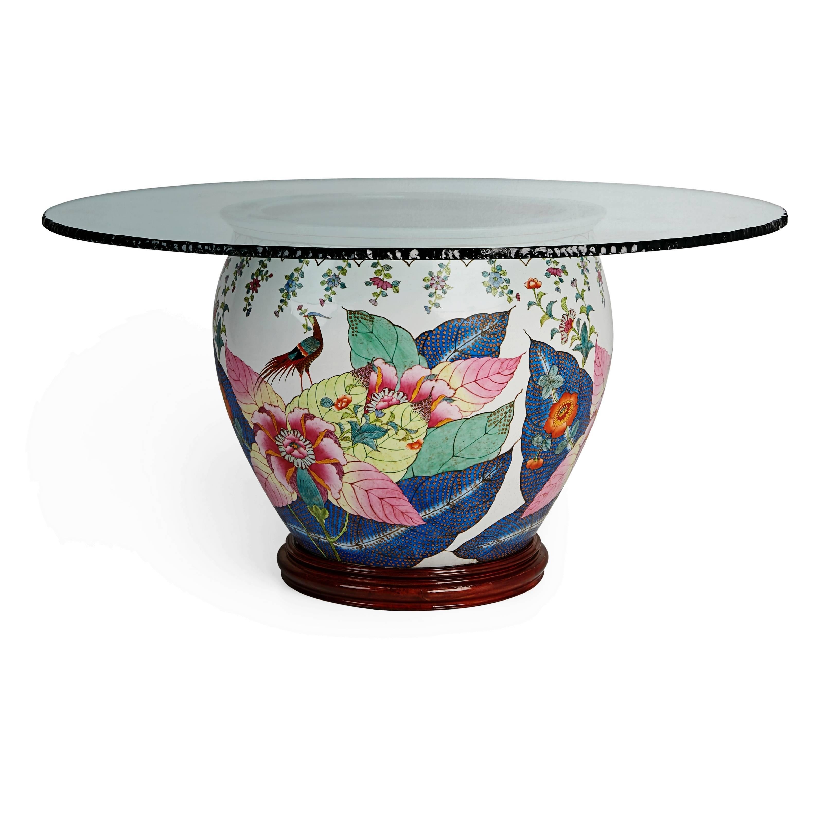*NOTE* For all items from this dealer, please click VIEW ALL FROM SELLER below on this page.

Elegantly designed chinoiserie style dining table. Featuring a glazed porcelain urn style base which has been hand-painted with colorful floral decoration
